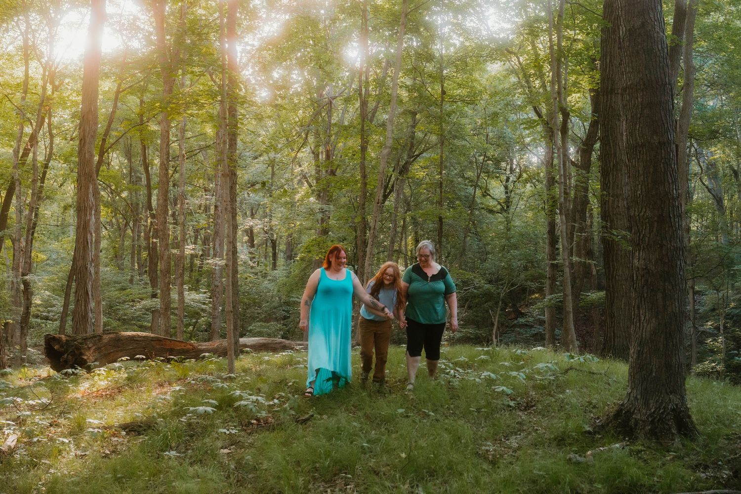 family walking through the woods