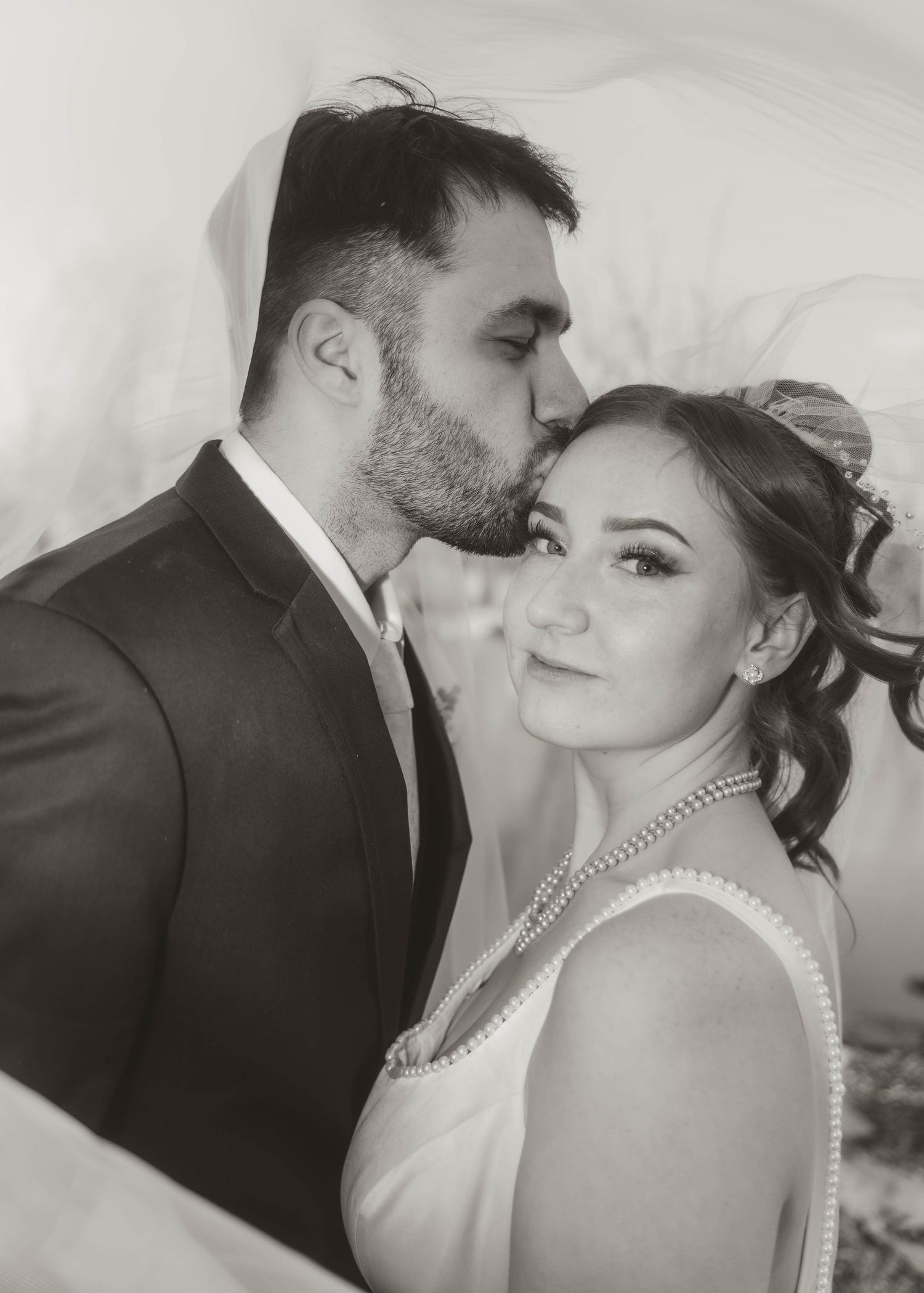black and white photo of newly wed bride and groom