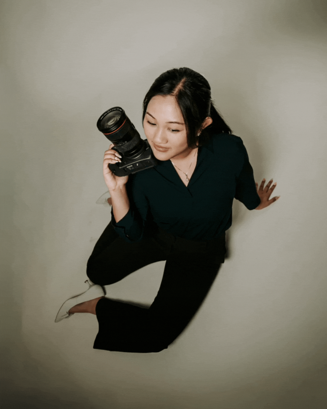 Artistic black and white portrait series showing graceful dance movements in dramatic lighting against neutral background.