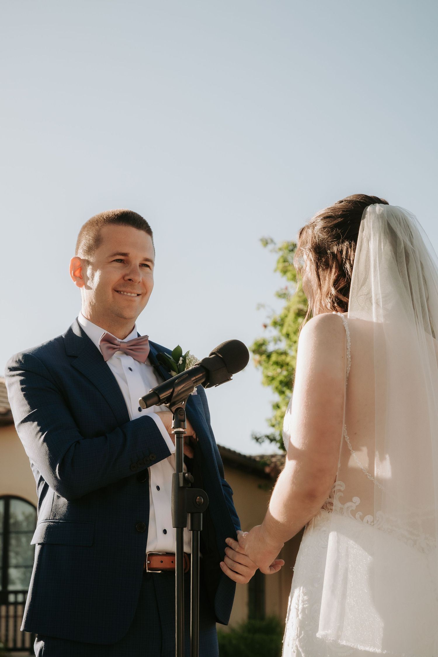 A sequence of wedding ceremony photos showing tender moments between the couple during their vows and ring exchange.