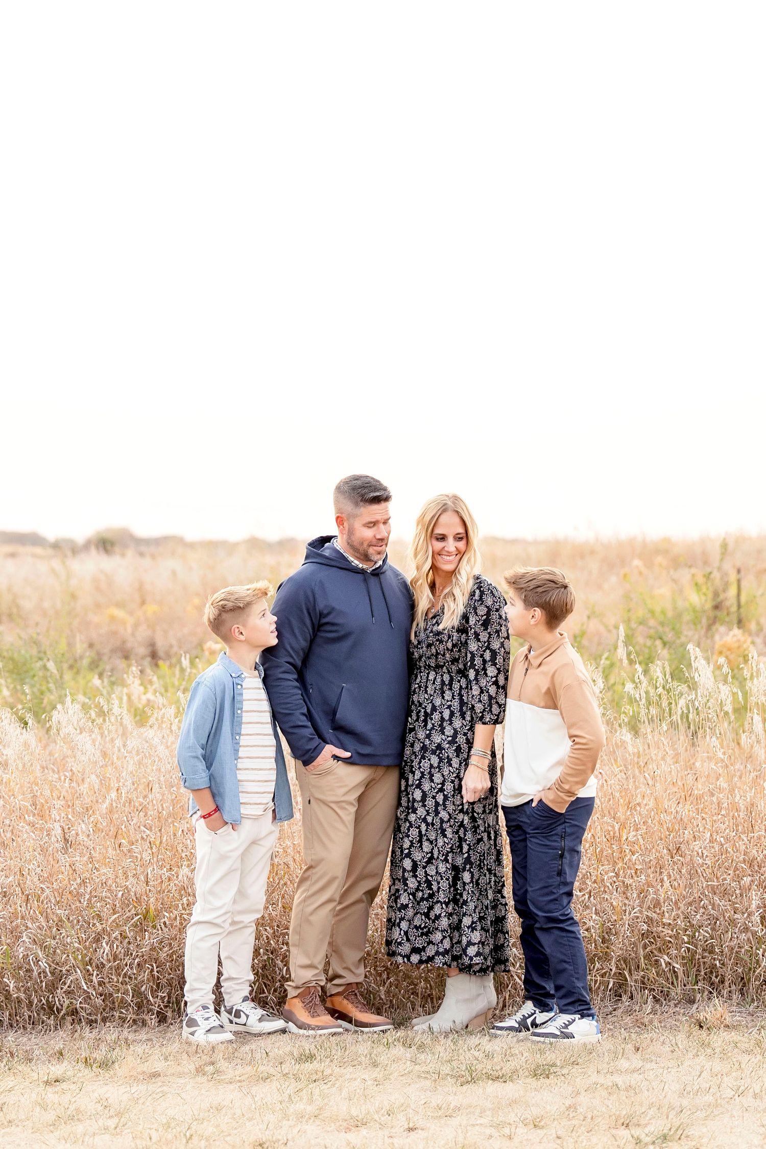 Clear Lake Family photos session during the fall in a tall grassy field.