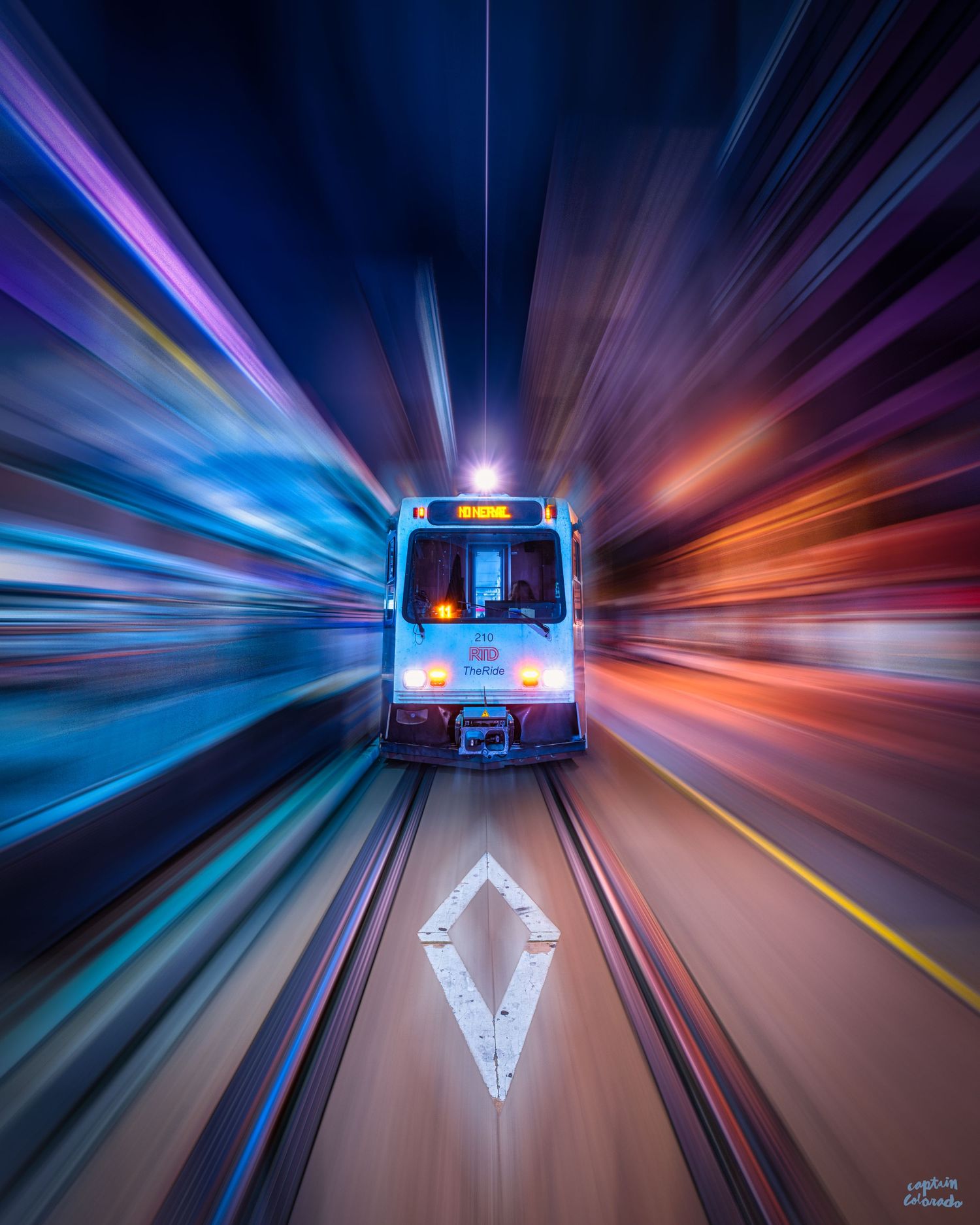 Surging train shot in downtown Denver by Denver Hospitality, Travel & Tourism photographer Captain Colorado Photography.