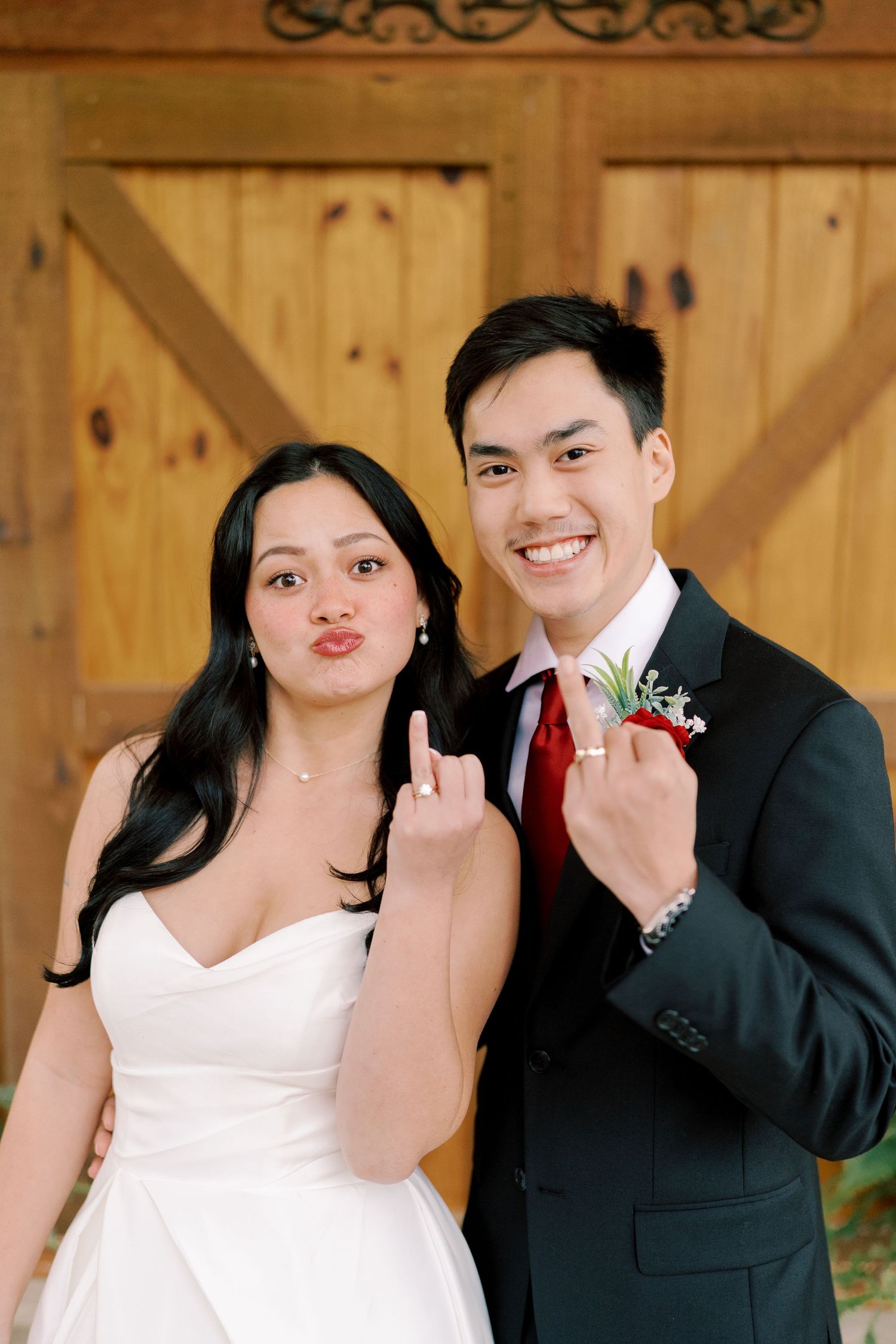 Fun and playful wedding portrait series with the couple making silly faces and poses.