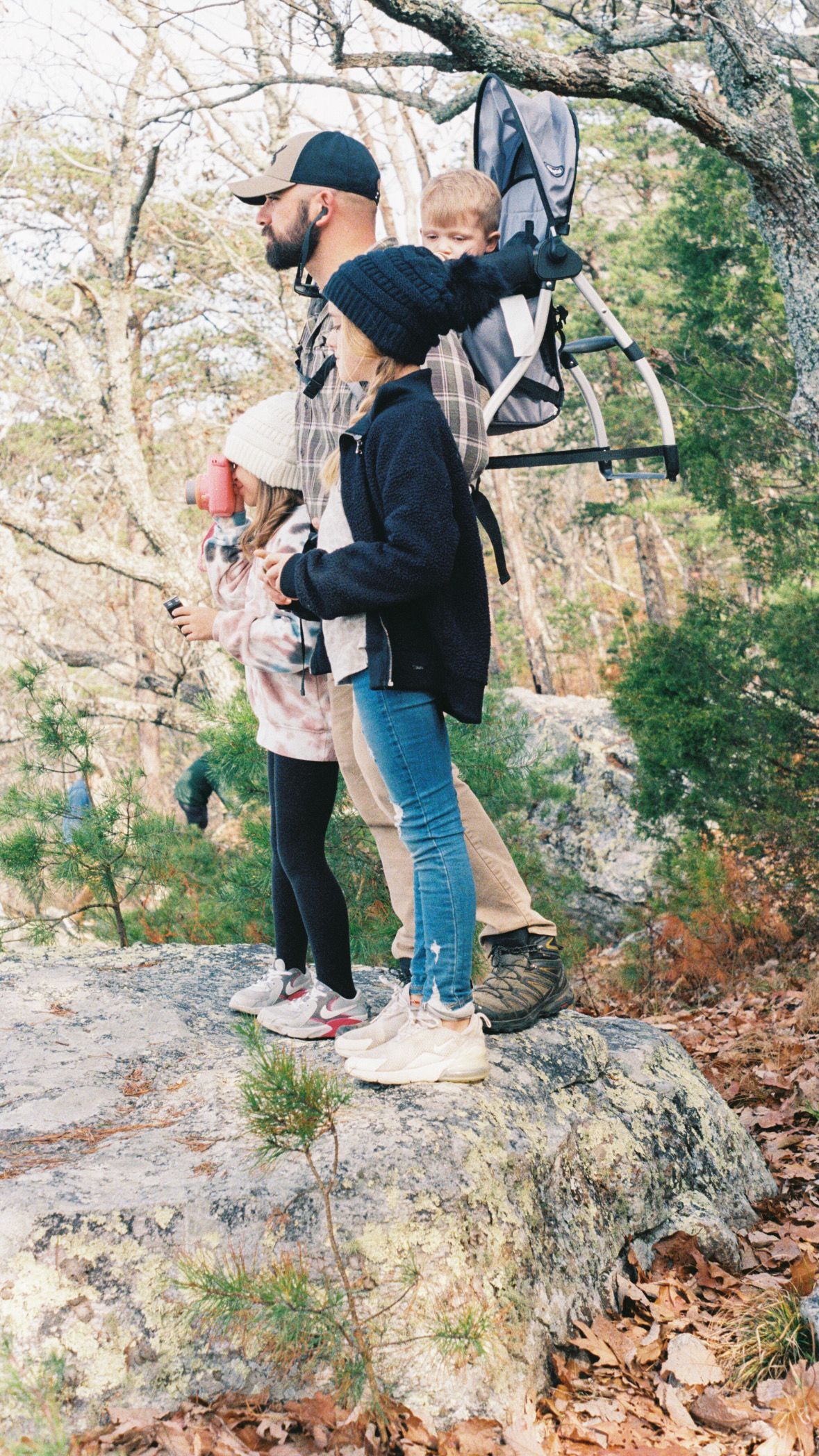 Group exploring rocky terrain during an outdoor adventure.