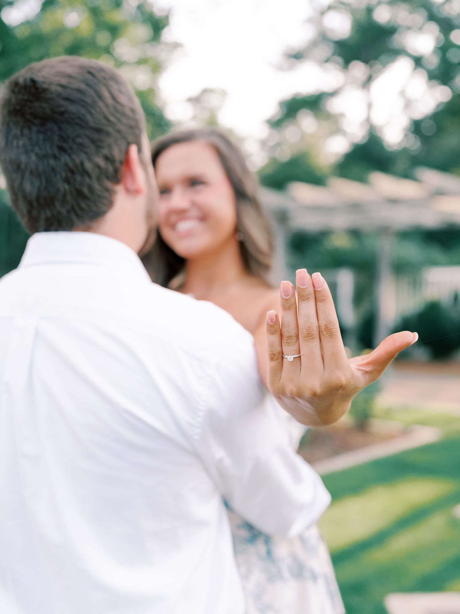 A series of playful moments captured during an outdoor engagement photo session.