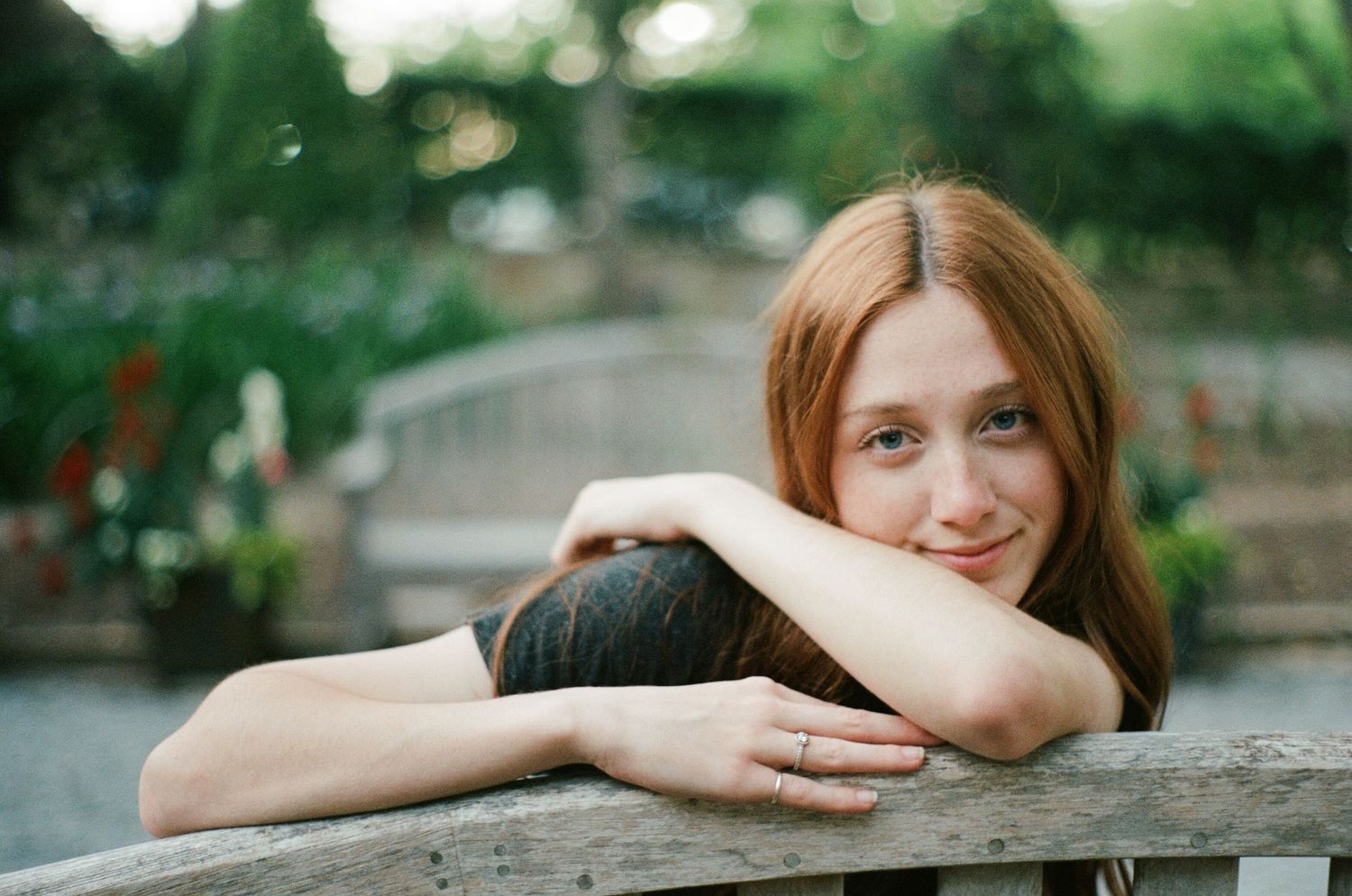 Artistic photo sequence of someone resting on weathered wood railing outdoors.
