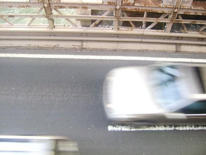 Blurred motion of cars driving on a highway or road.