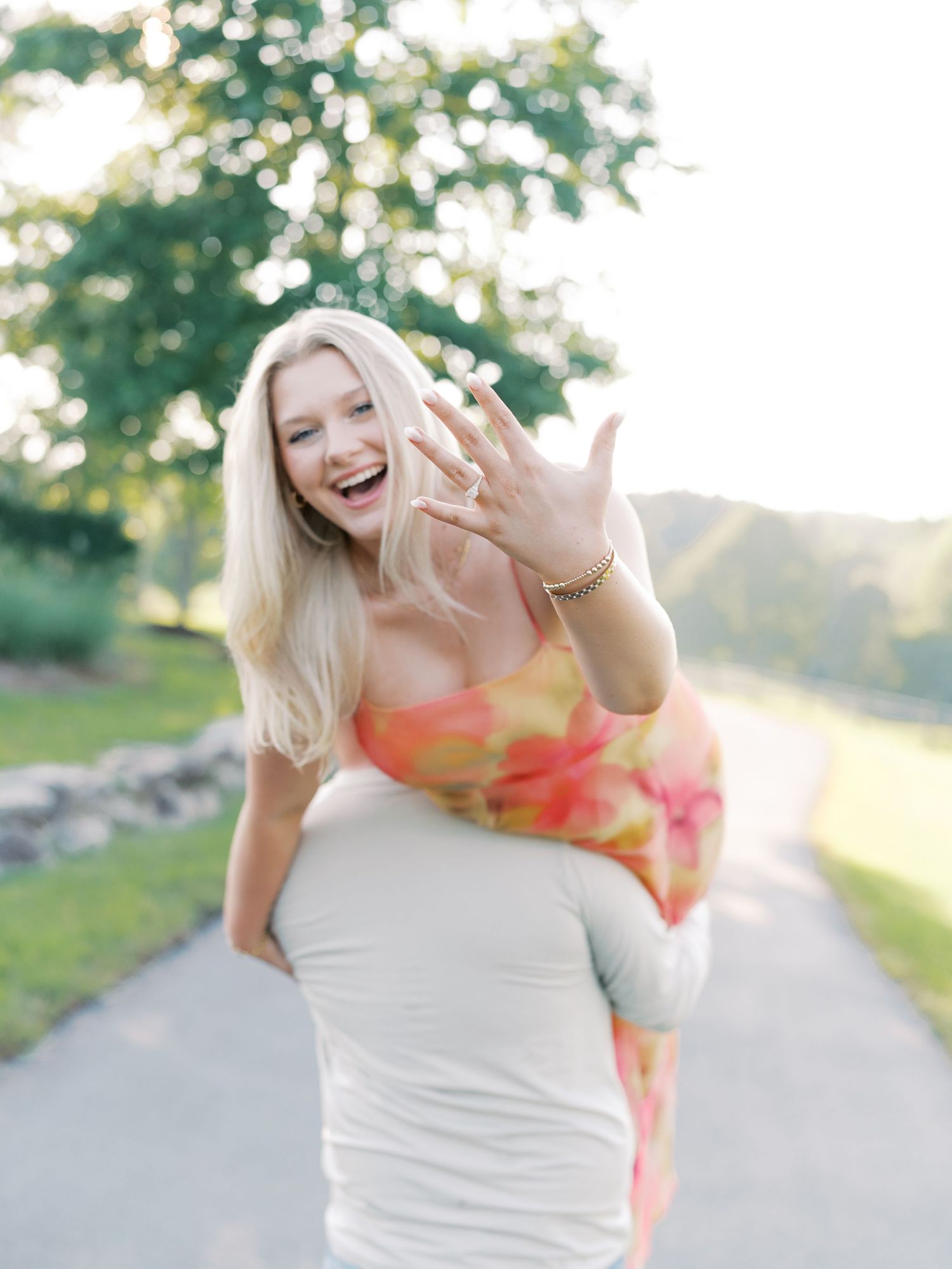 Joyful expressions captured in bright outdoor setting with natural lighting.