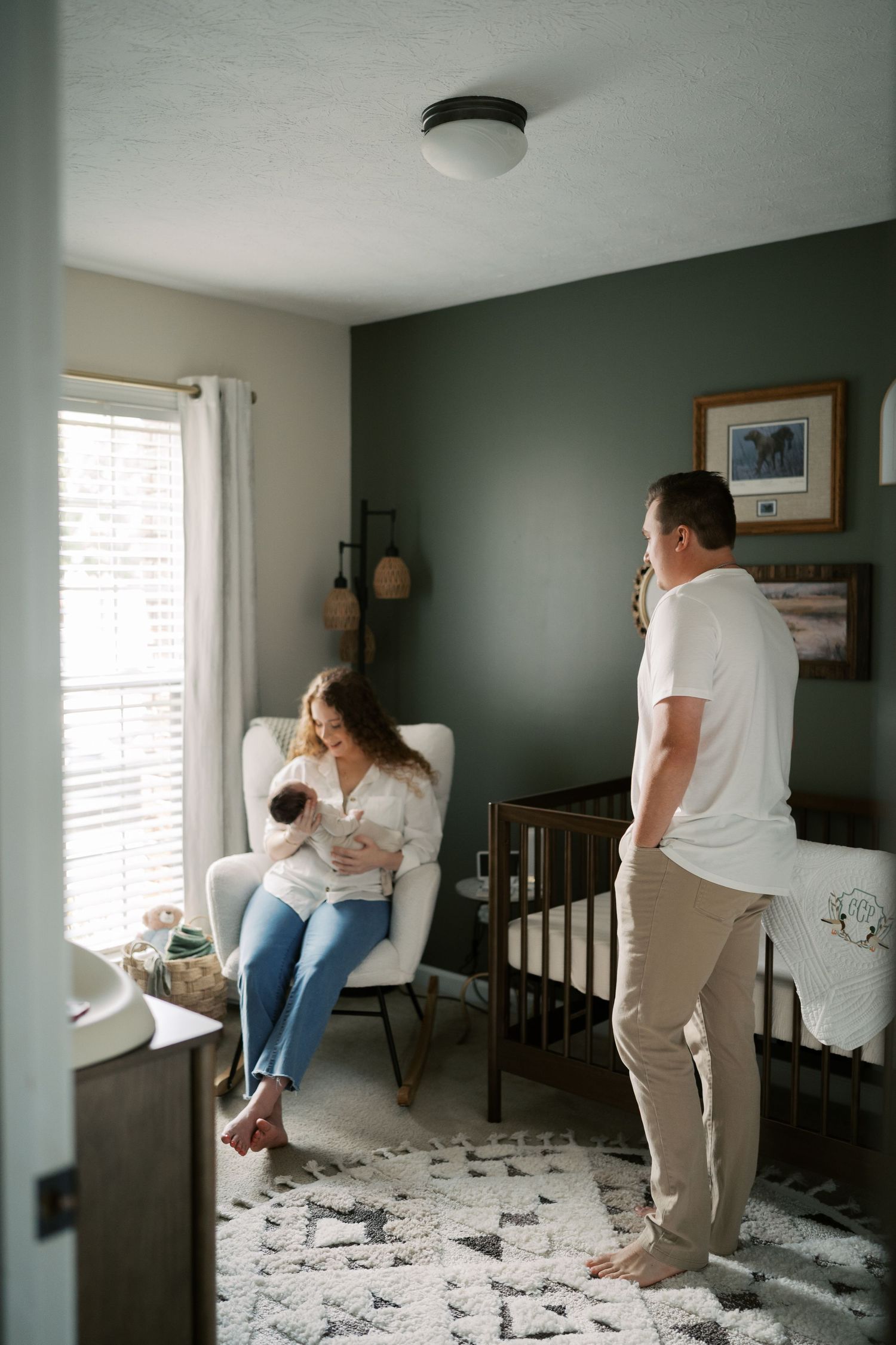 A series of intimate lifestyle photos showing tender moments in a nursery with natural window light.