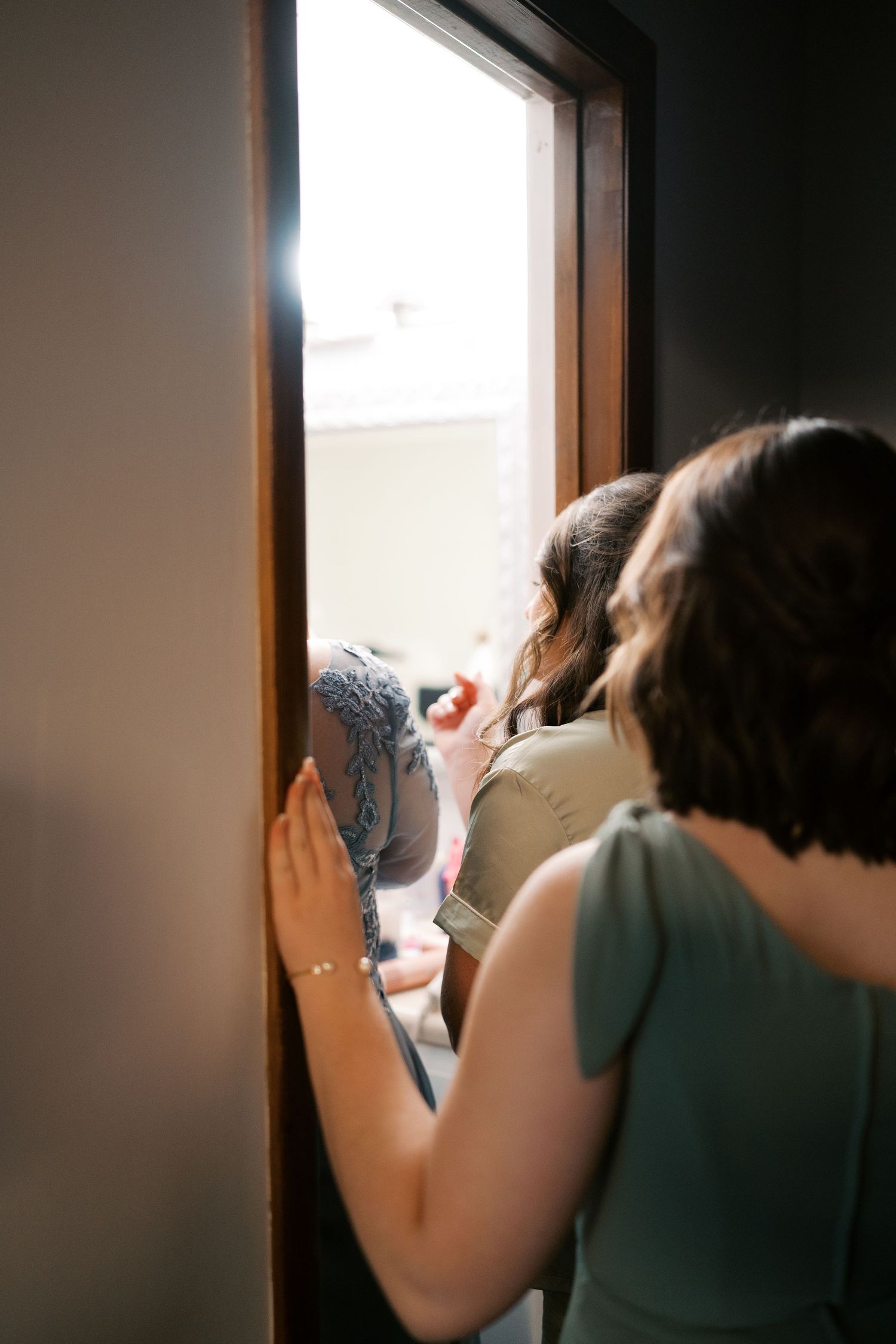 View through window of someone looking outside during daytime.