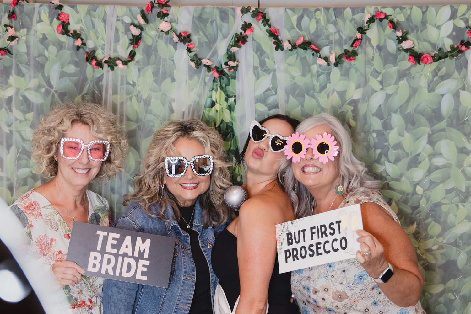 Bridal Shower Photo Booth rental in Saint Charles County, Missouri. Photo Booth props and party accessories against a leafy backdrop.