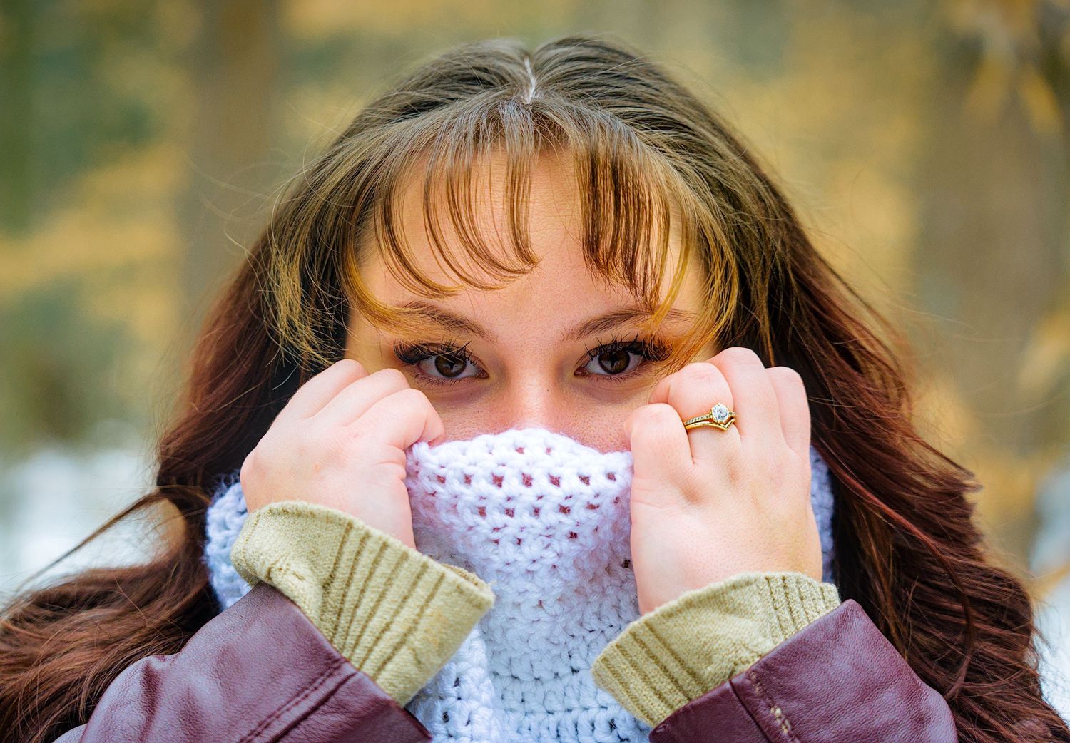 A series of photos showing someone wearing different crocheted face masks in white and tan colors against a blurred background.