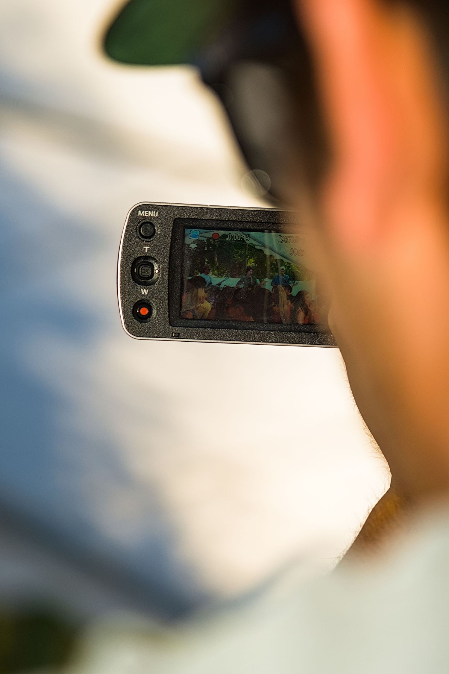 Close-up view of a digital camera display screen showing blurred imagery.