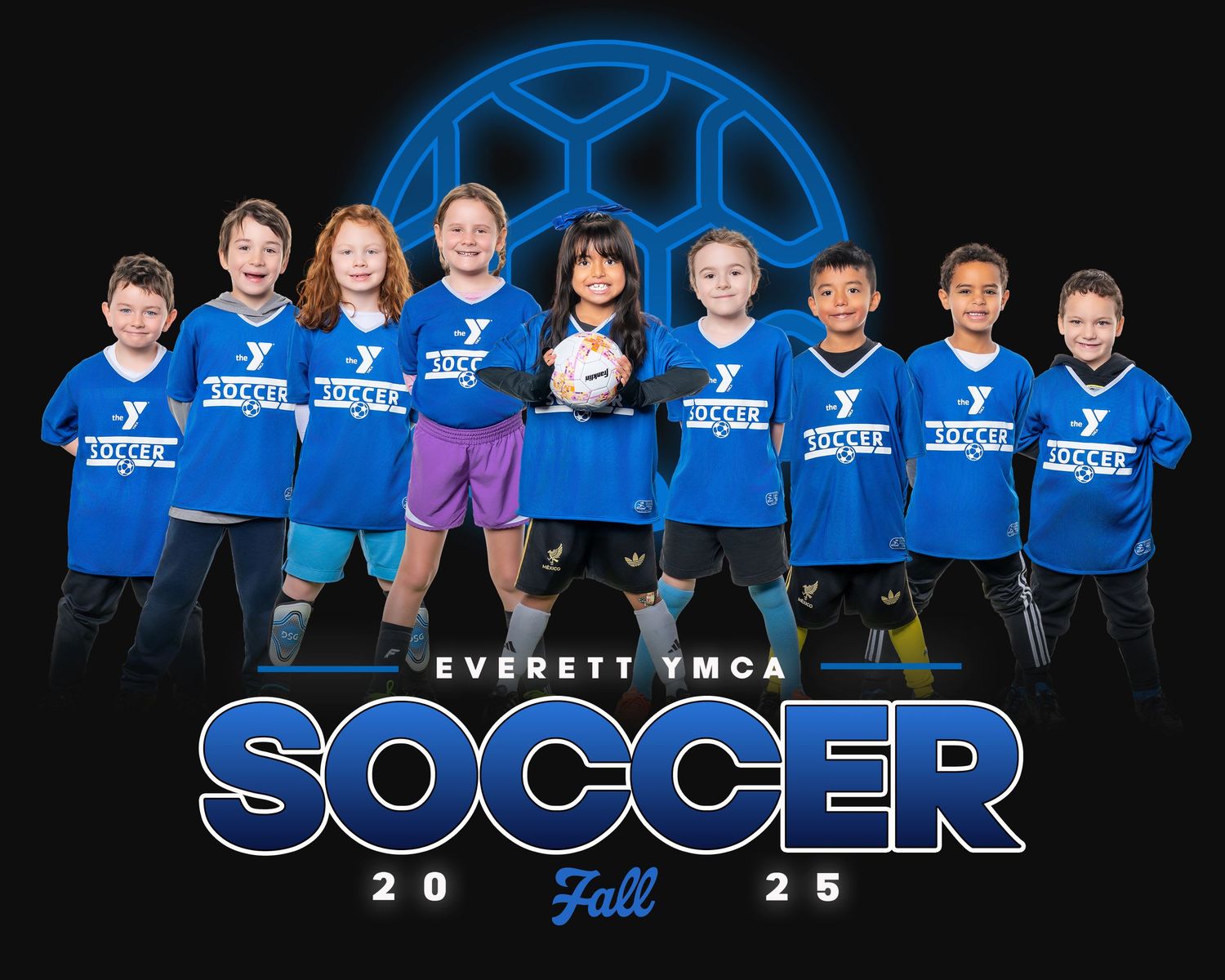 Youth soccer team wearing blue jerseys poses together for team photo with YMCA Soccer Fall 2022 text overlay.