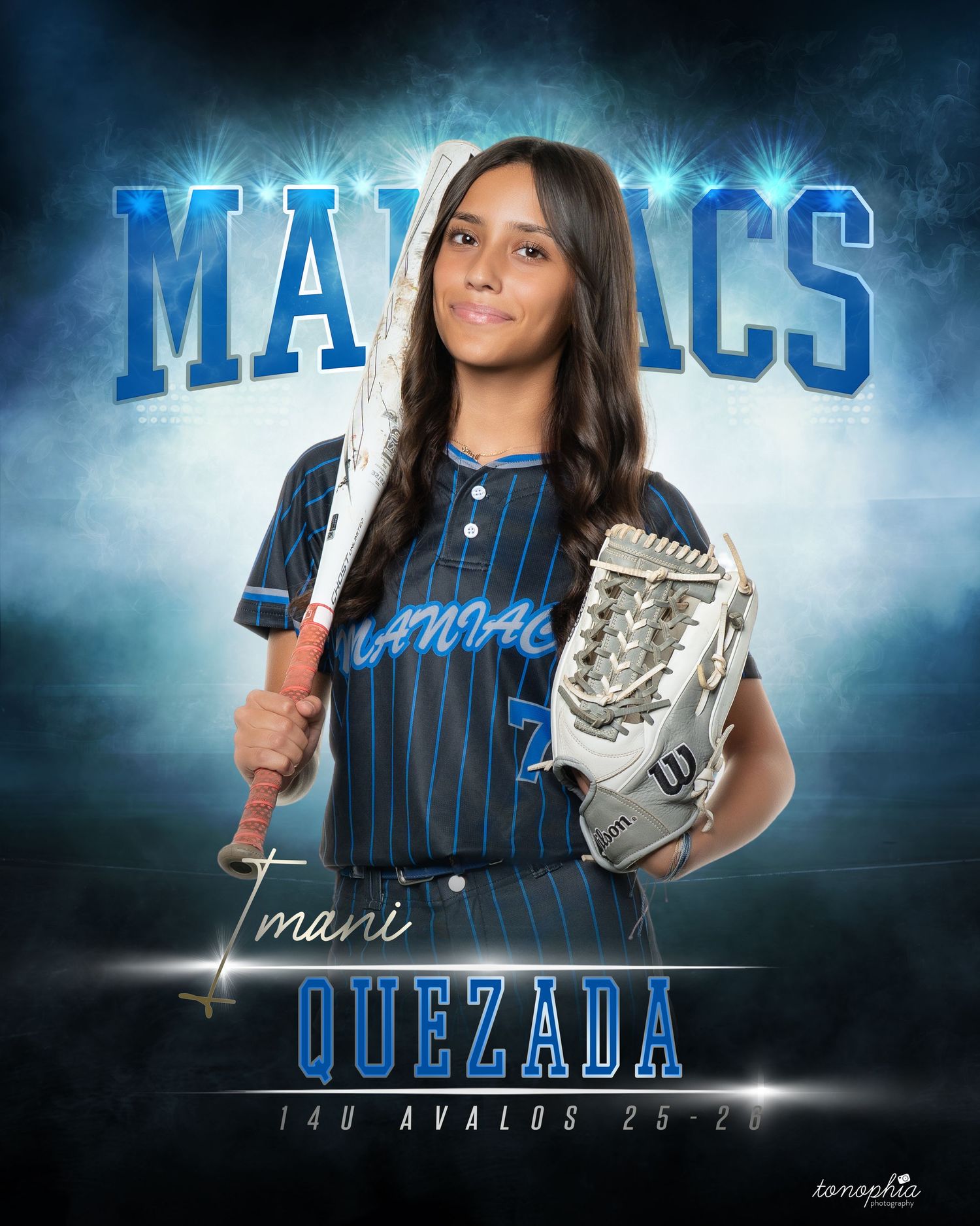 Softball player poses with glove and bat in blue pinstriped uniform against dramatic backdrop.
