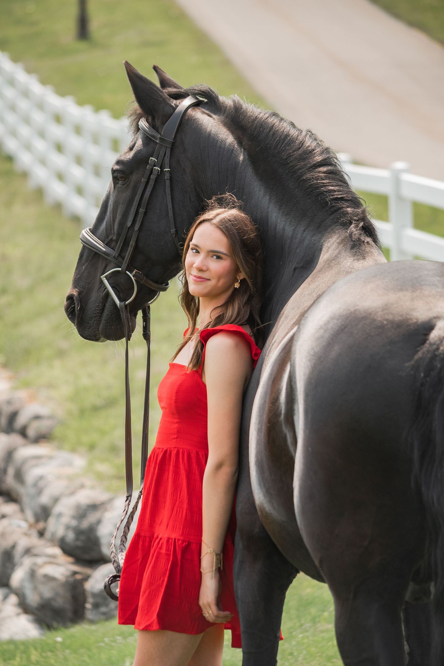 girl smiling with horse