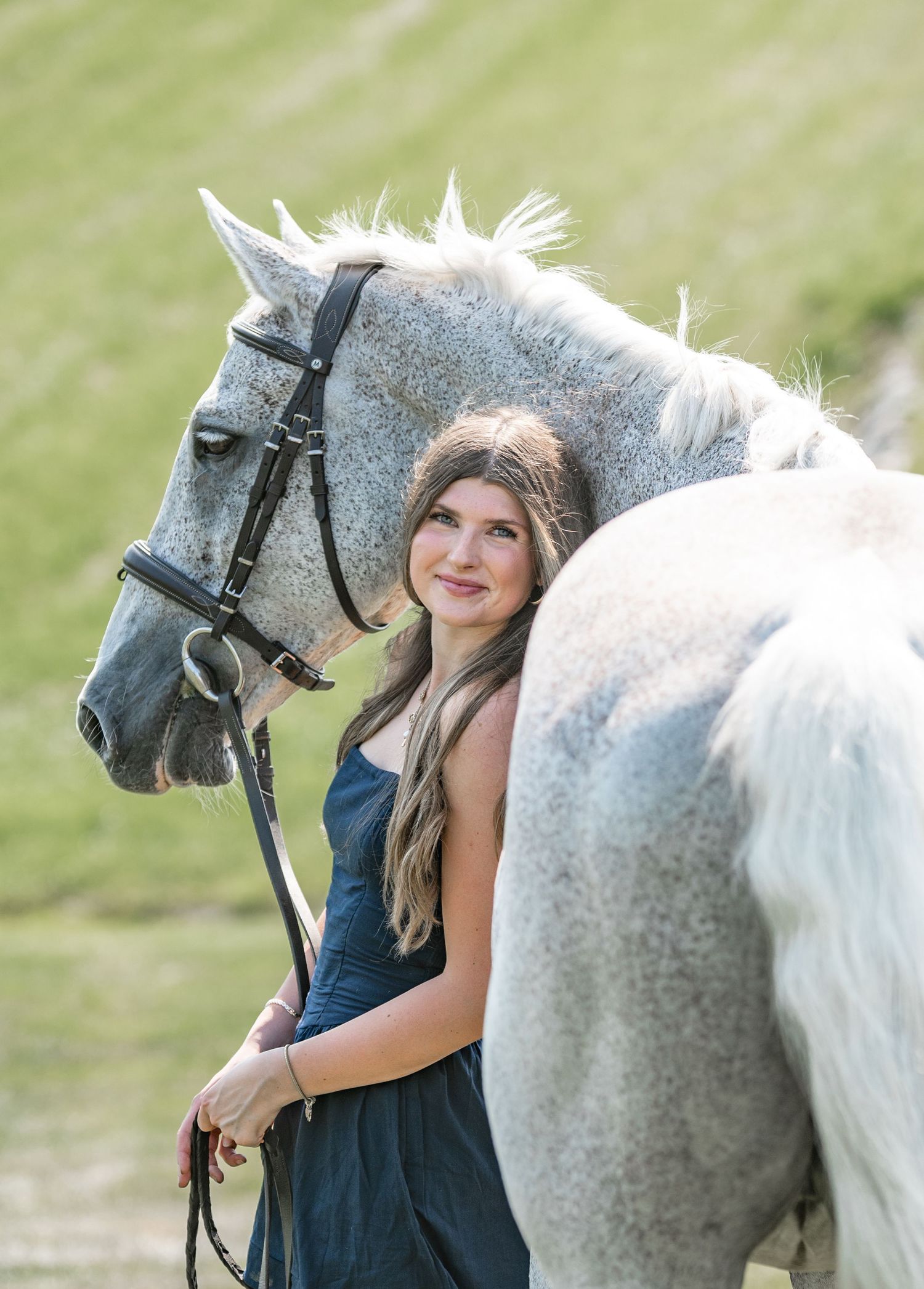 girl posing with her horse