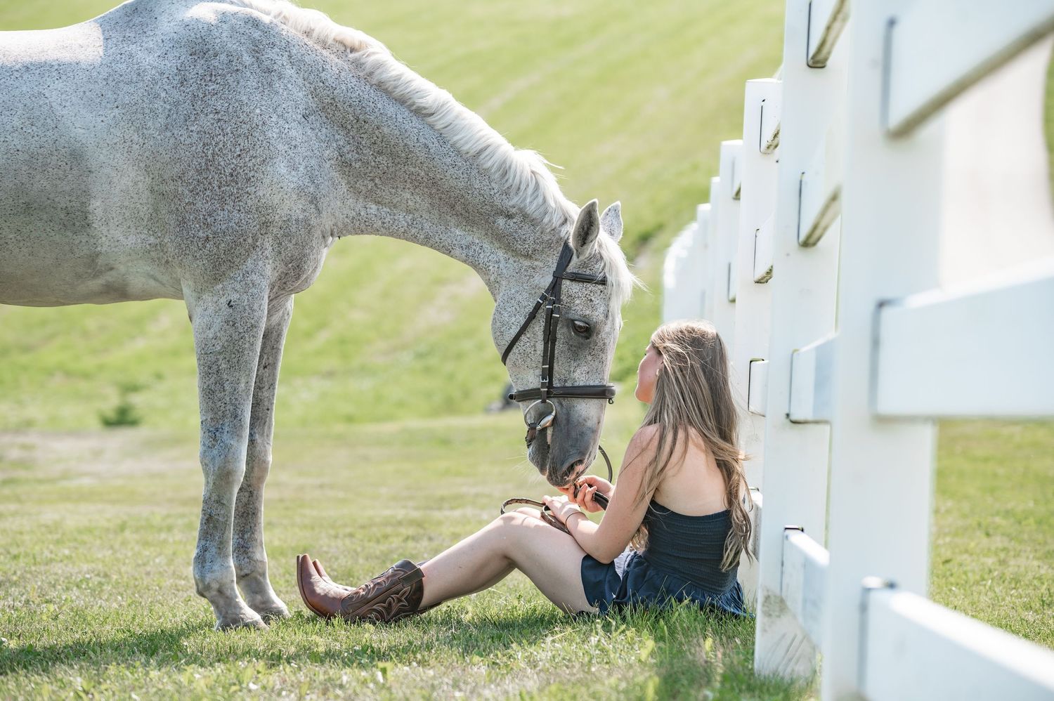 girl smiling with horse