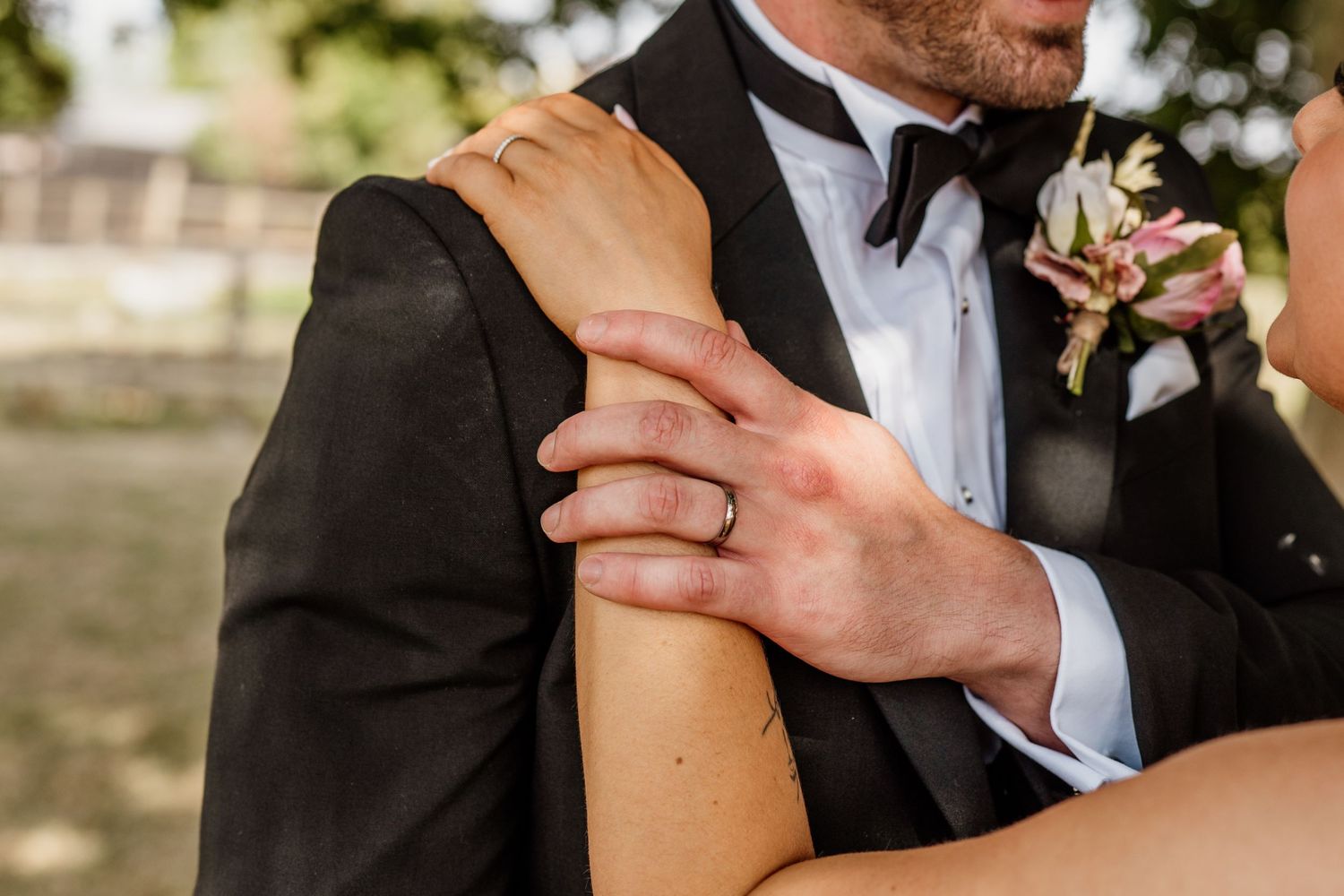 Close-up details of a romantic wedding couple sharing intimate moments together.