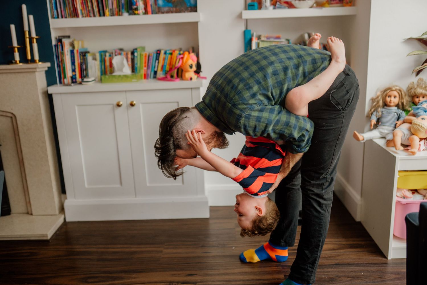 Series of candid family photos with built-in bookshelves visible in the background.