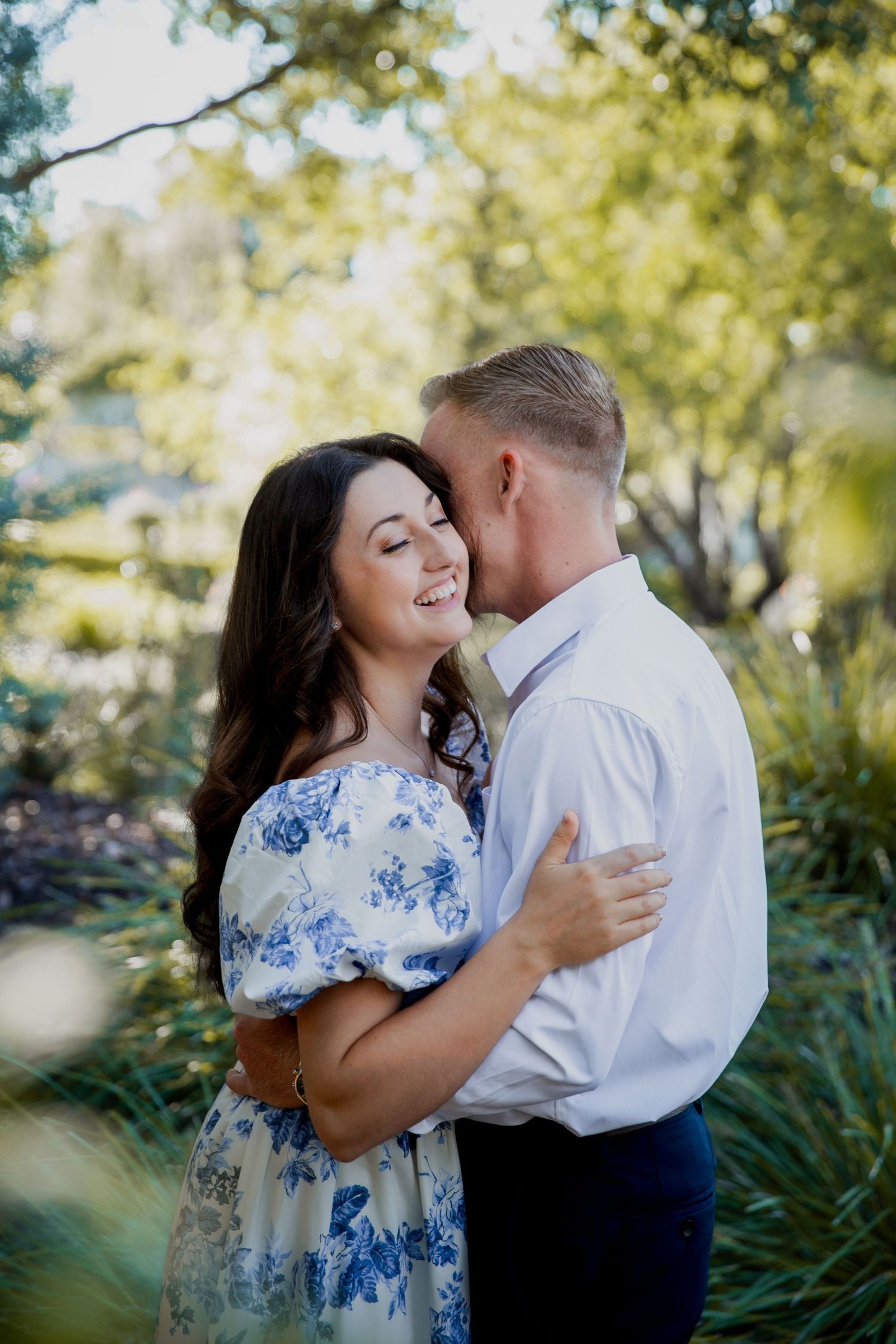 Young couple hugging in an outdoor setting