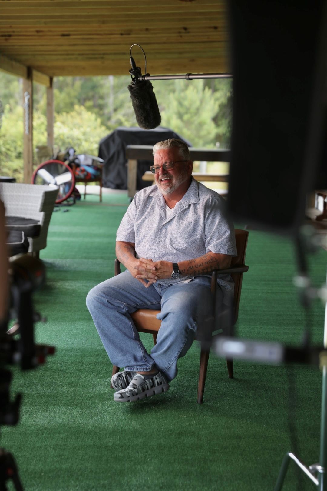 Man being interviewed on camera