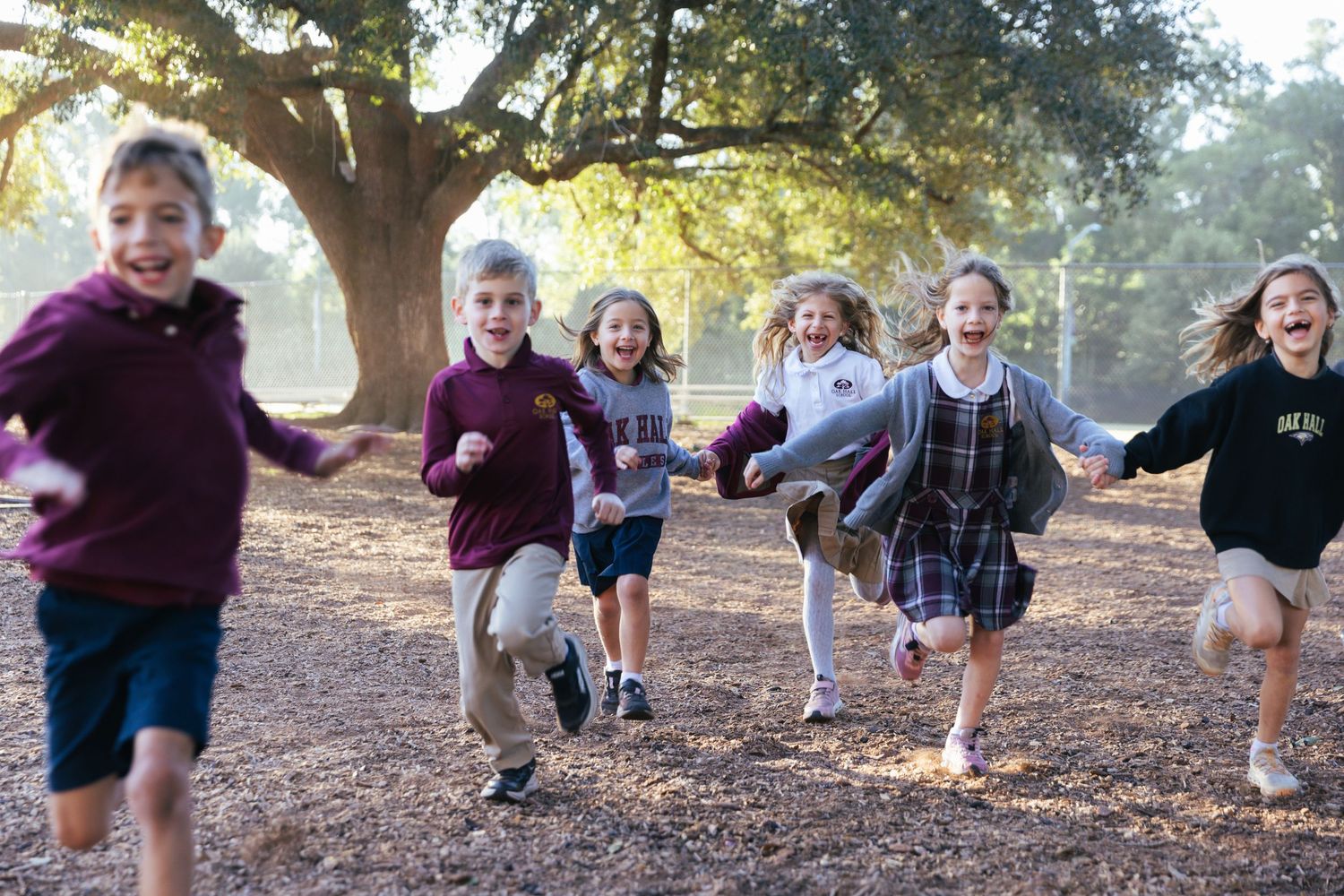 Kids running on a blayground