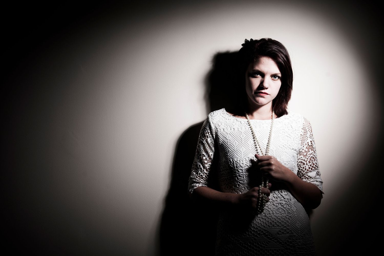 Dramatic black and white portrait series with vignette lighting effect. .Portrait Photographer in Guelph Ontario
