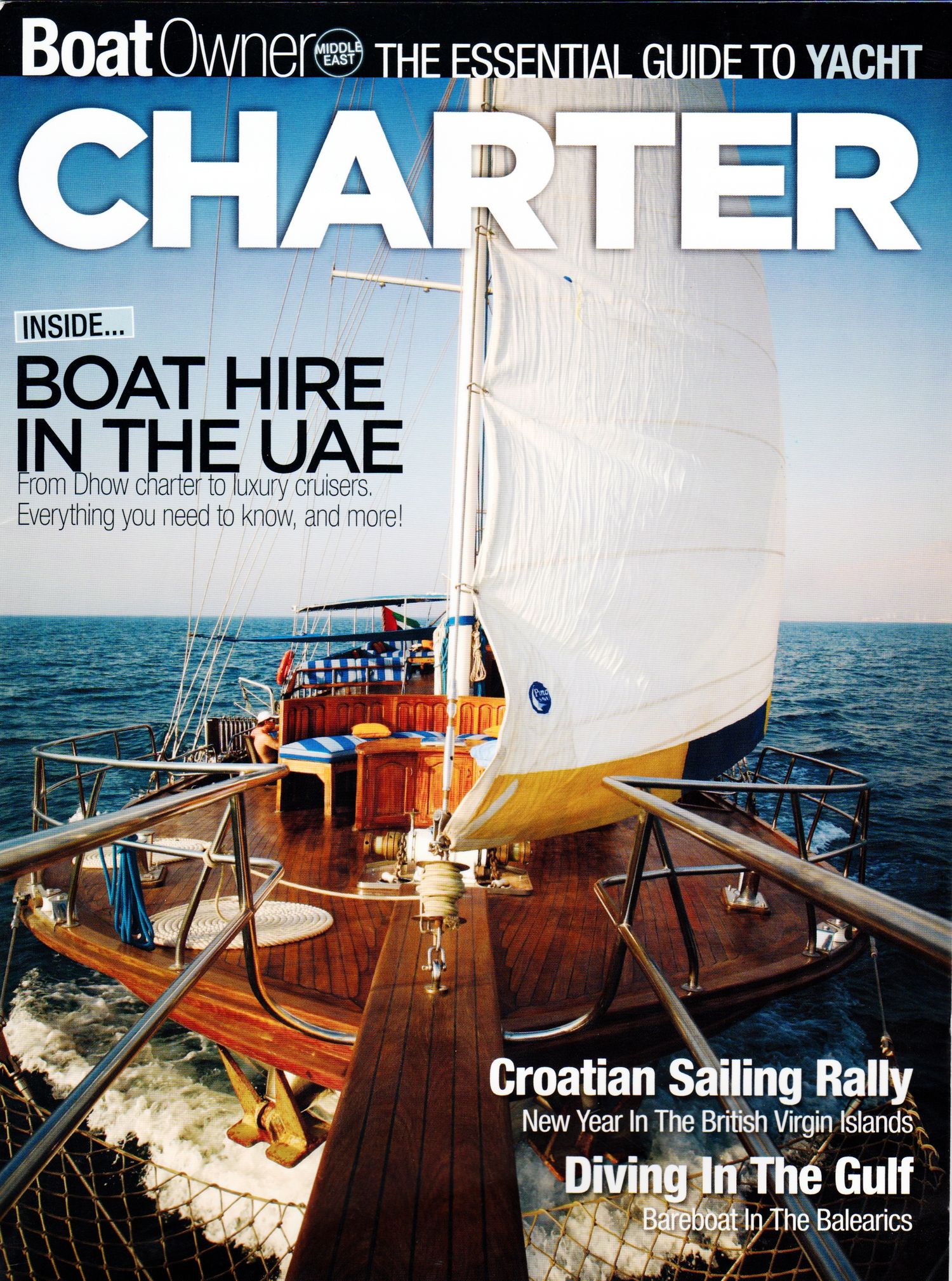 Collection of luxury yacht magazine covers showing sailing and charter destinations in the UAE and Mediterranean. Editorial Photographer in