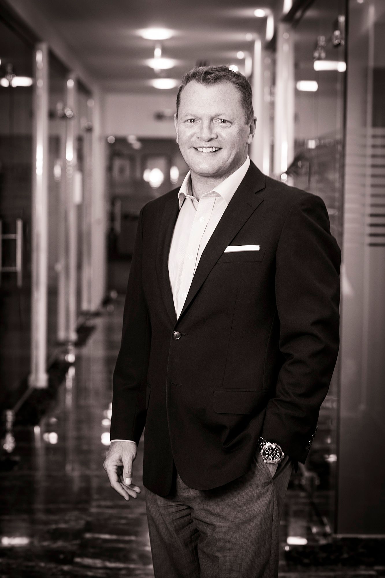 Professional portrait in black and white of person in business attire. Commercial Photographer in Guelph Ontario