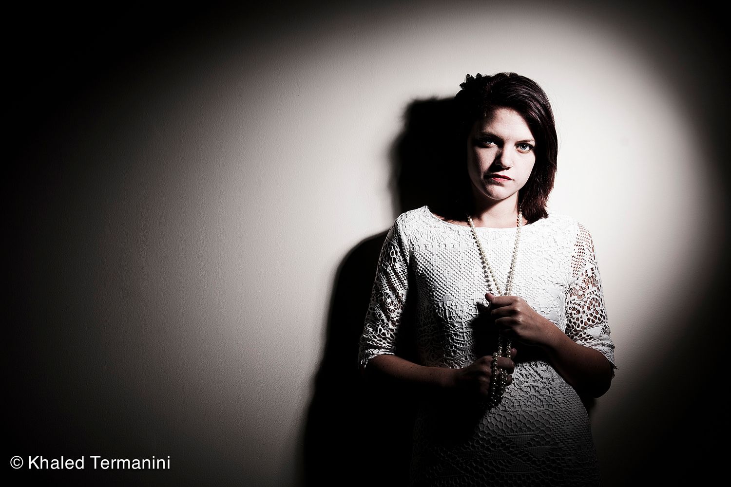 Artistic portrait series with dramatic shadows and lighting effects.Portrait Photographer in Guelph Ontario
