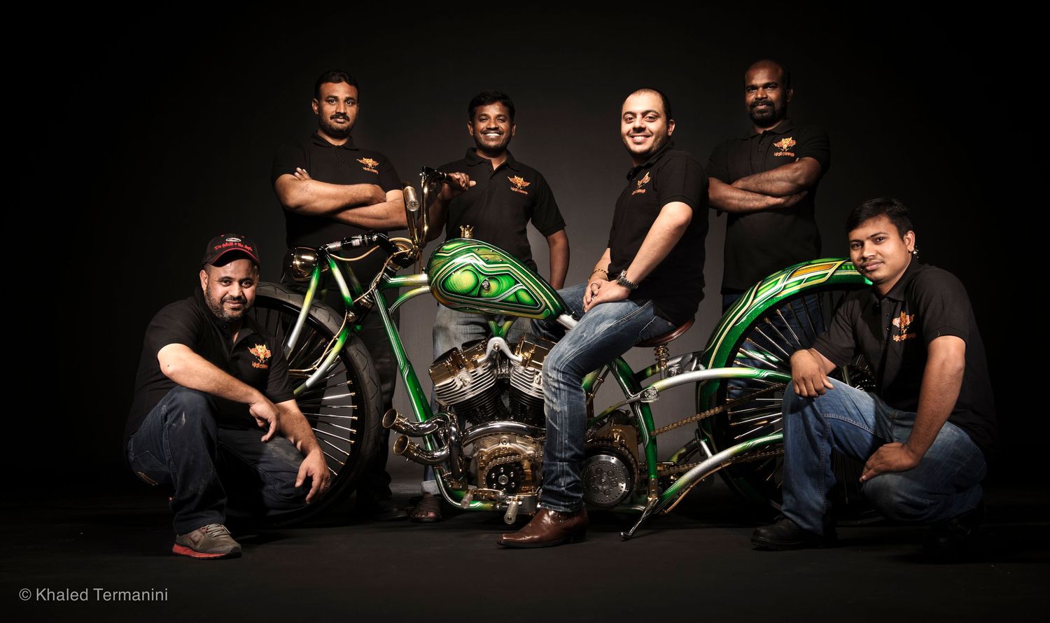 Group photo session with custom motorcycles in dark studio setting. .Portrait Photographer in Guelph Ontario