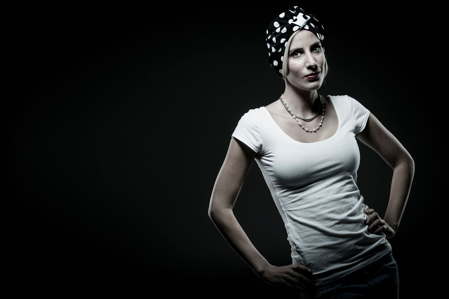 Artistic black and white portrait with dramatic side lighting. Portrait Photographer in Ontario