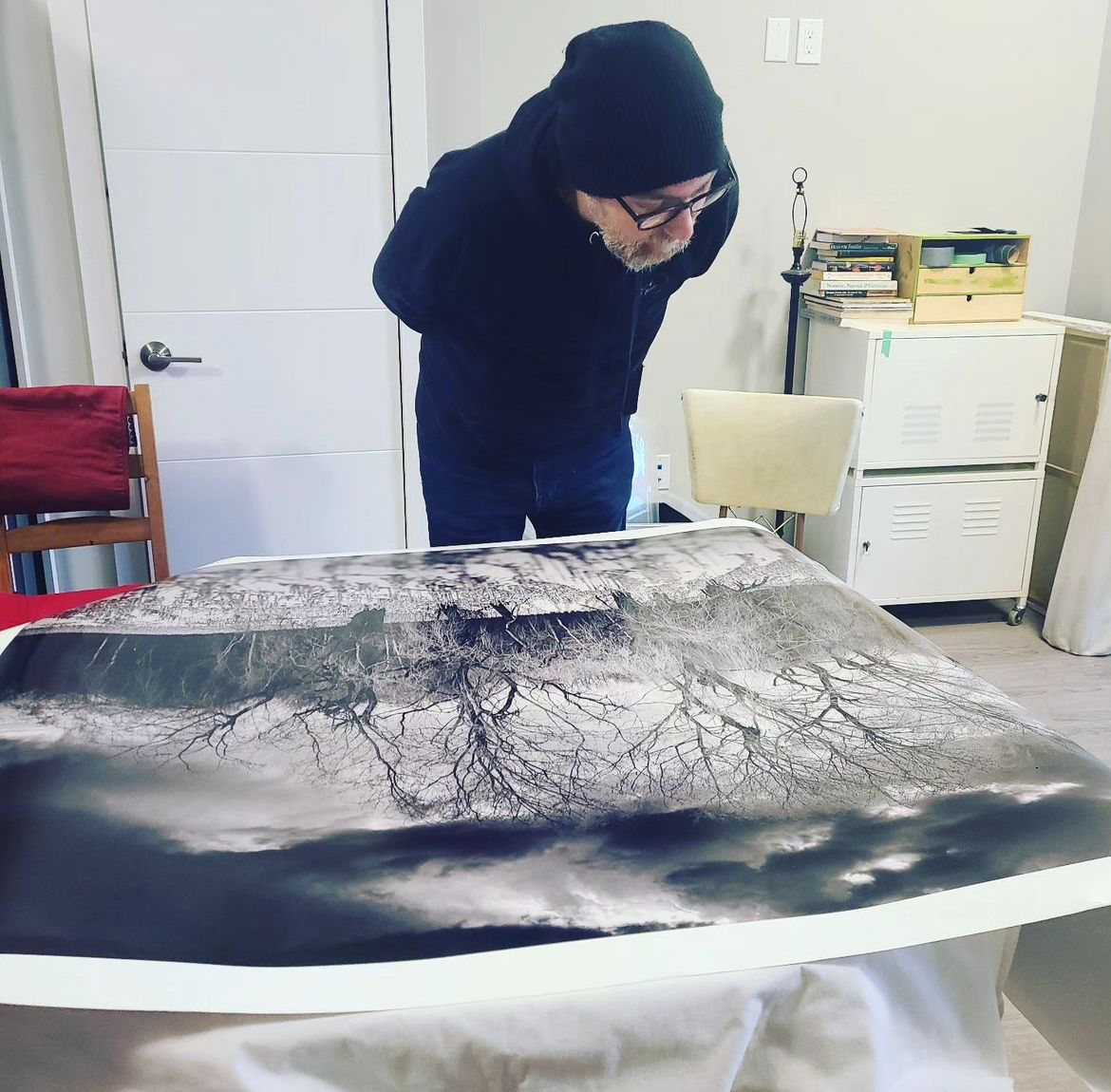 Black and white panoramic landscape prints laid out on a white surface. Printing Services in Guelph, Kitchener, Waterloo and Cambridge