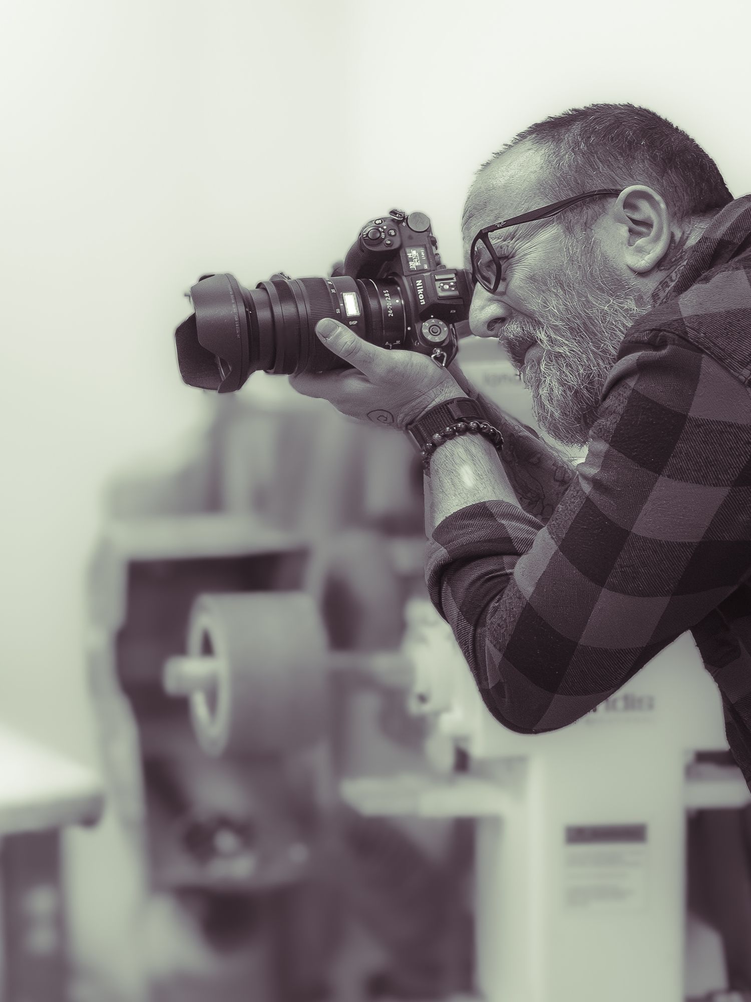 Row of photographers with cameras lined up taking photos at an event. Commercial Photographer in Guelph and surrounding areas