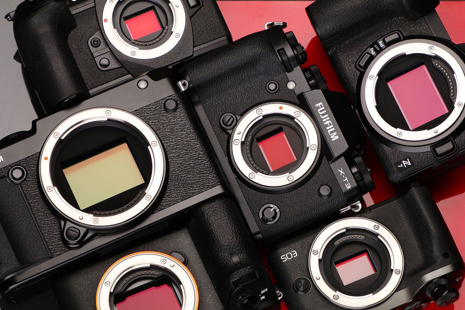 Row of camera sensor mounts showing red interior elements in close-up view.photography workshops in guelph and surrounding areas