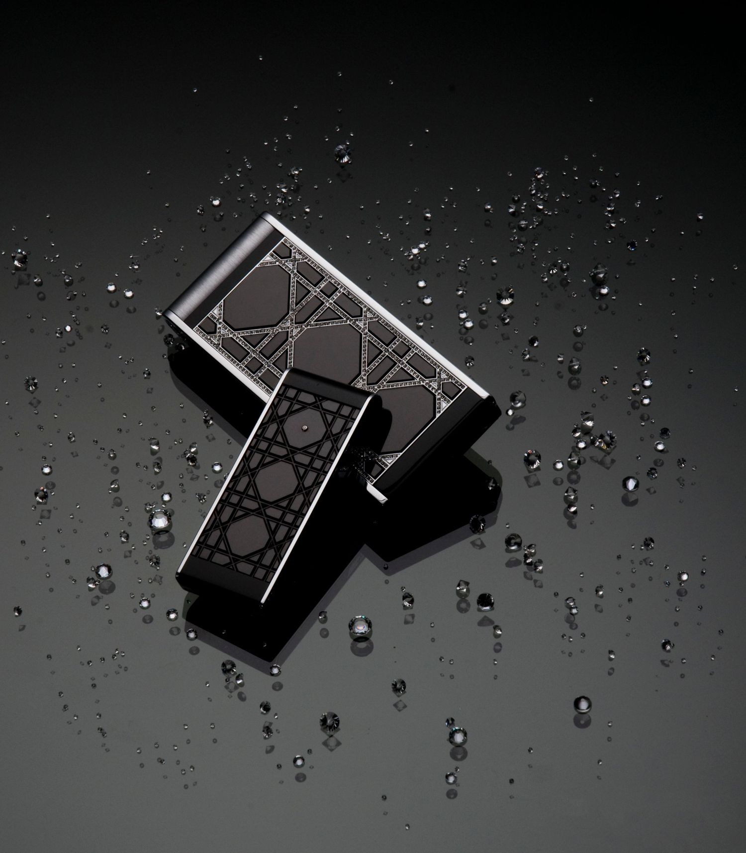 Abstract black and white image of water droplets on a dark surface with geometric shapes. Product Photography in Ontario