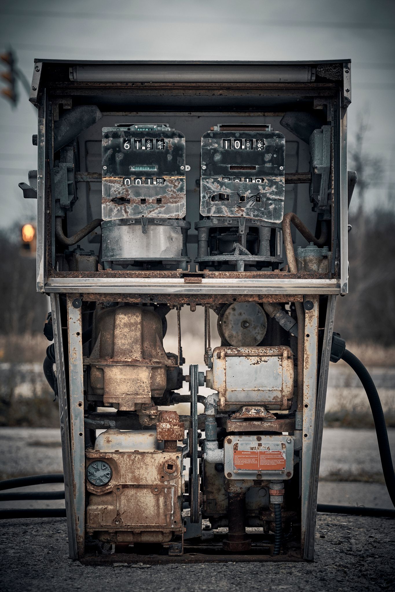 Close-up of rusty internal components of an old abandoned gas pump. Commercial Photographer in Guelph and surrounding areas