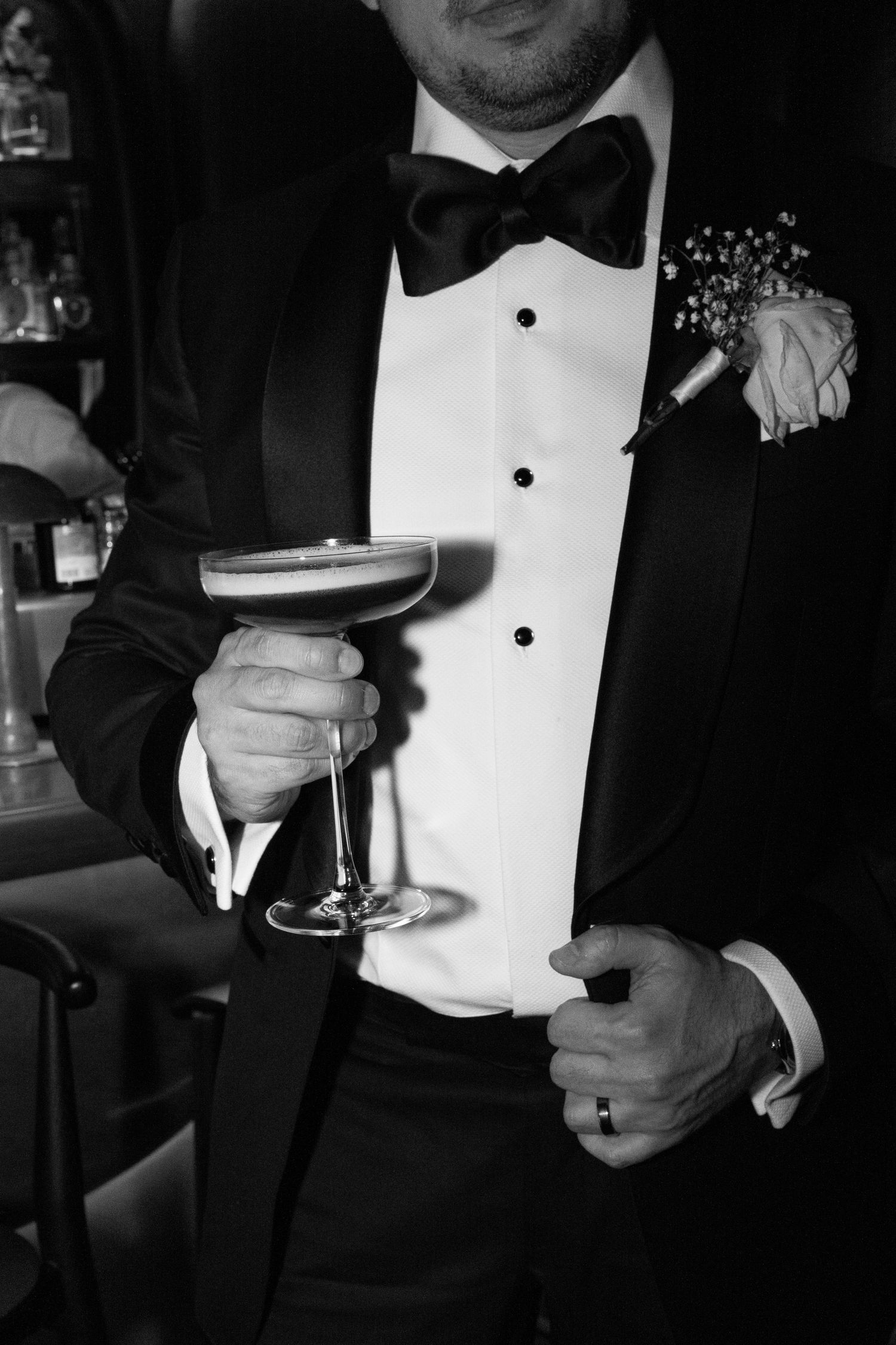 Close-up shots of formal tuxedo details in black and white.