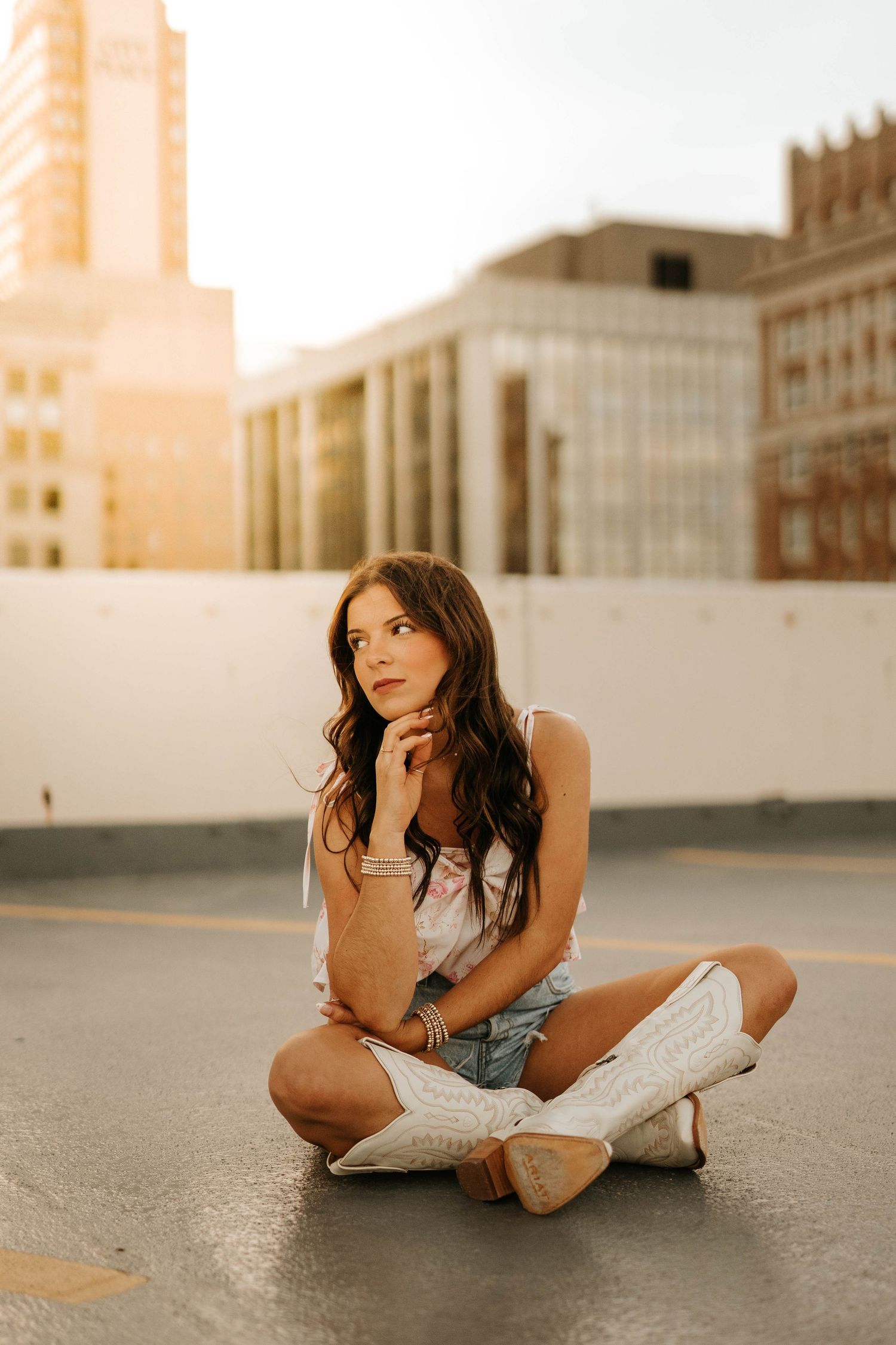 Urban rooftop photoshoot during golden hour with casual summer vibes.