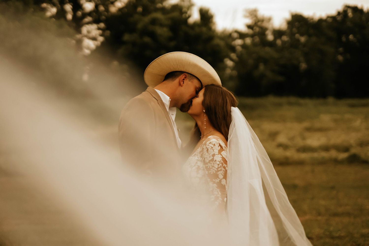 Soft focus wedding photography captures ethereal moments during golden hour.