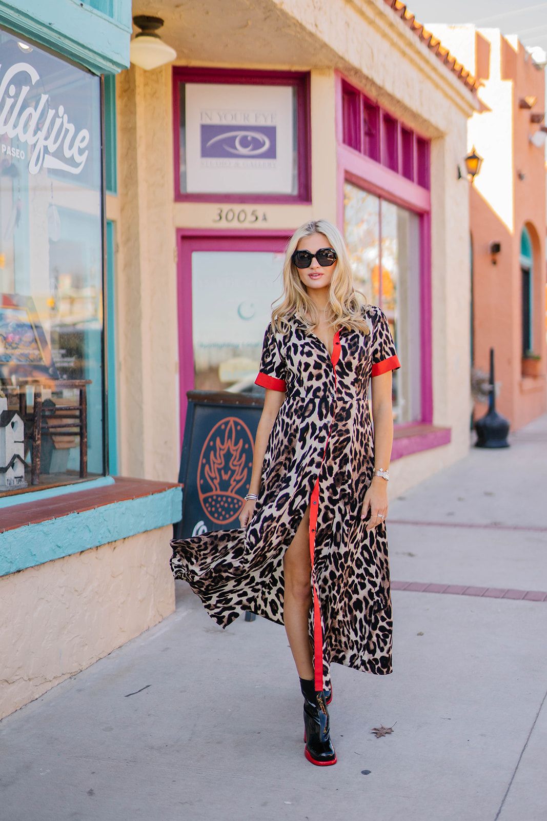 Street style photos featuring leopard print dress against colorful storefront.