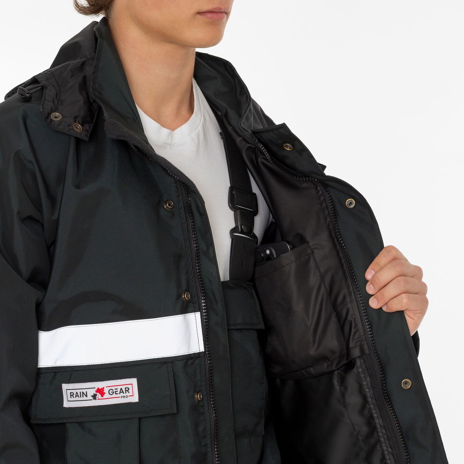 Black tactical work jacket with reflective stripe and interior pocket details.