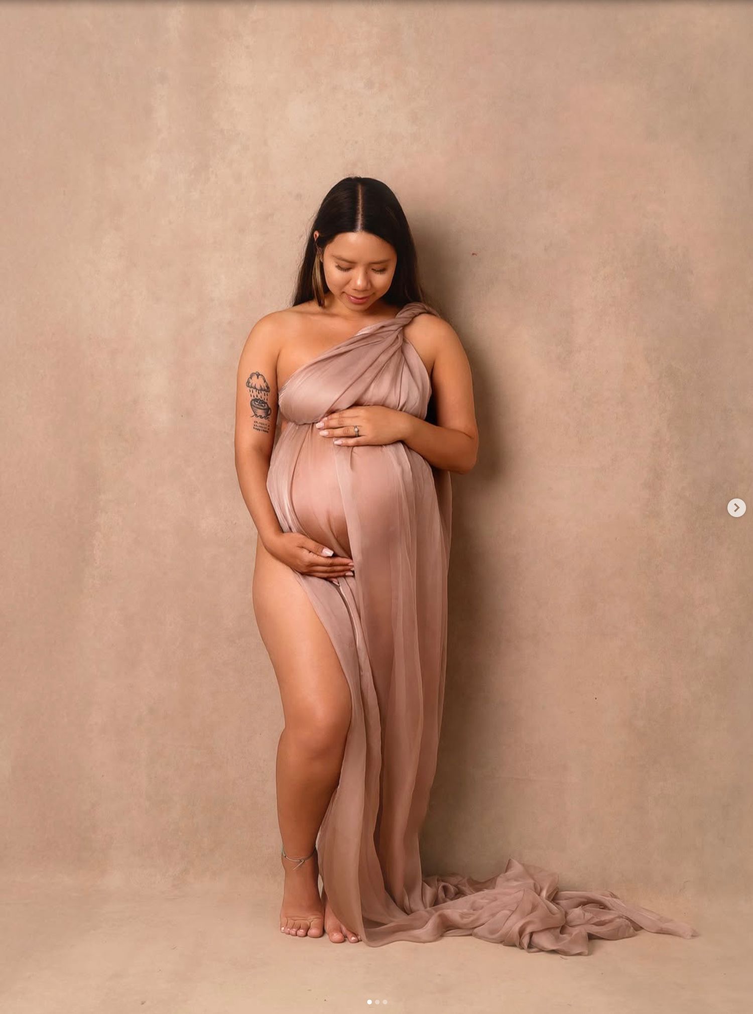 A maternity photoshoot series showing a person in a flowing dusty rose dress against a neutral backdrop.
