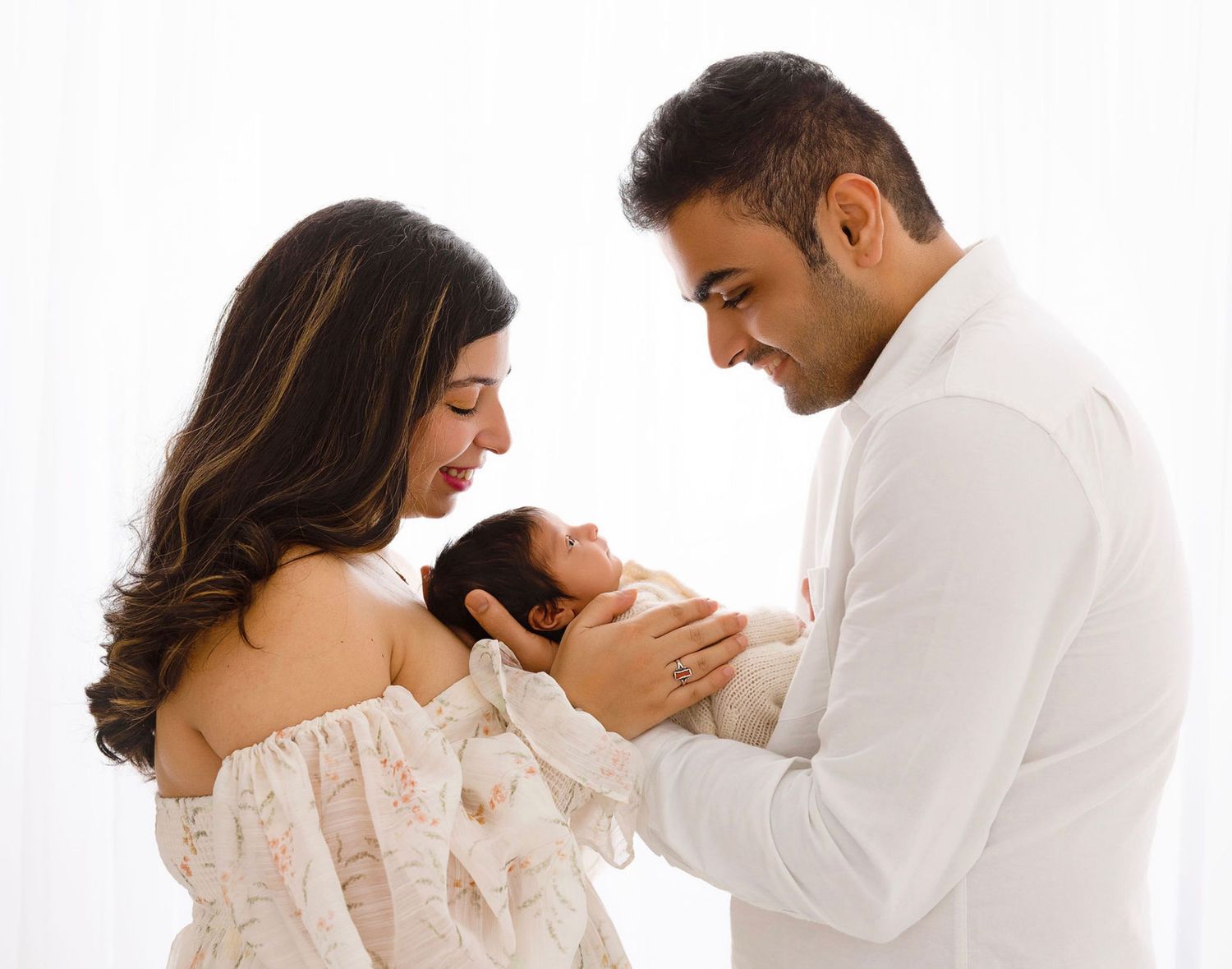 Seattle newborn family photography session done at studio. white and airy setup