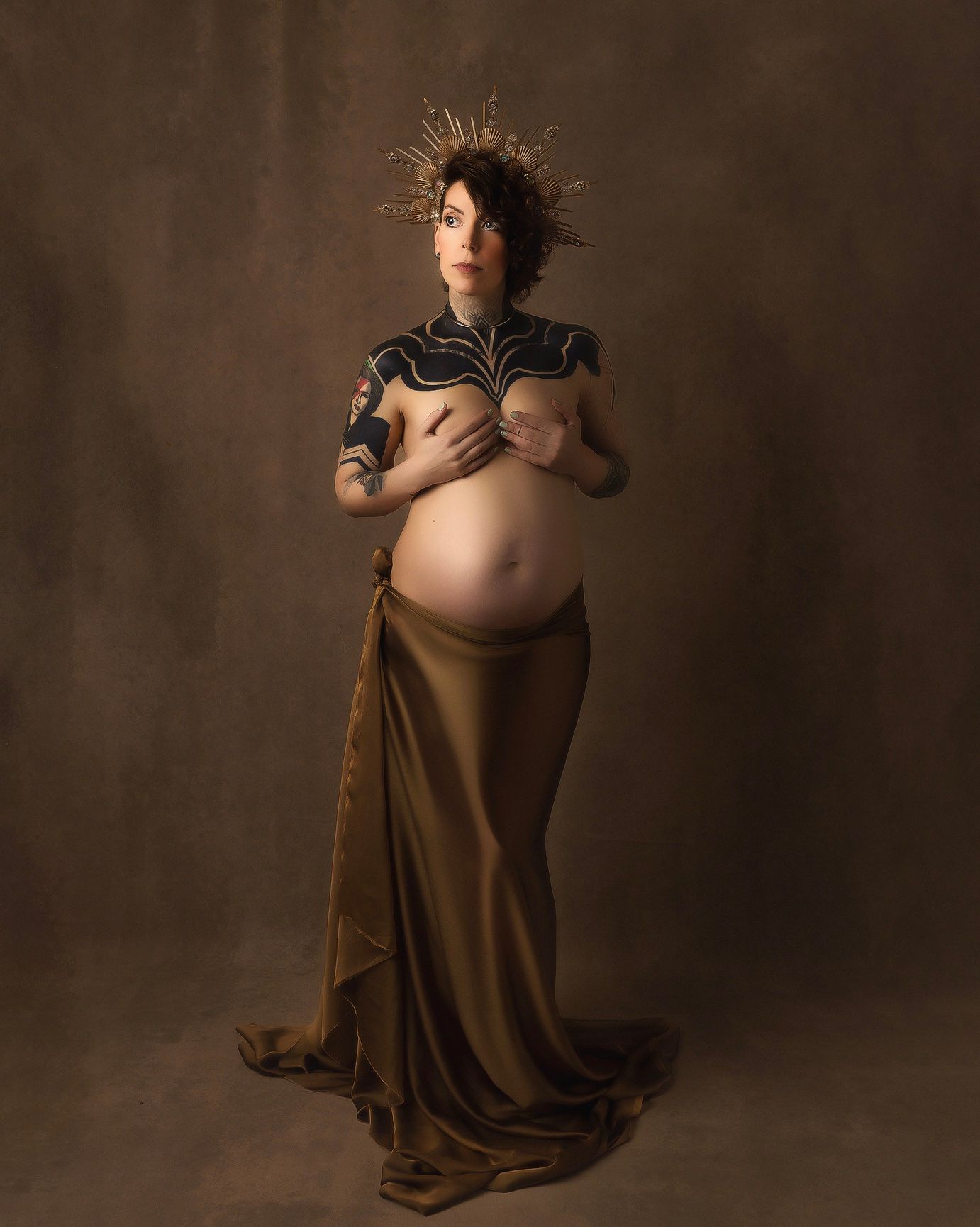 Artistic maternity portrait series showing silhouette poses against dark brown backdrop.