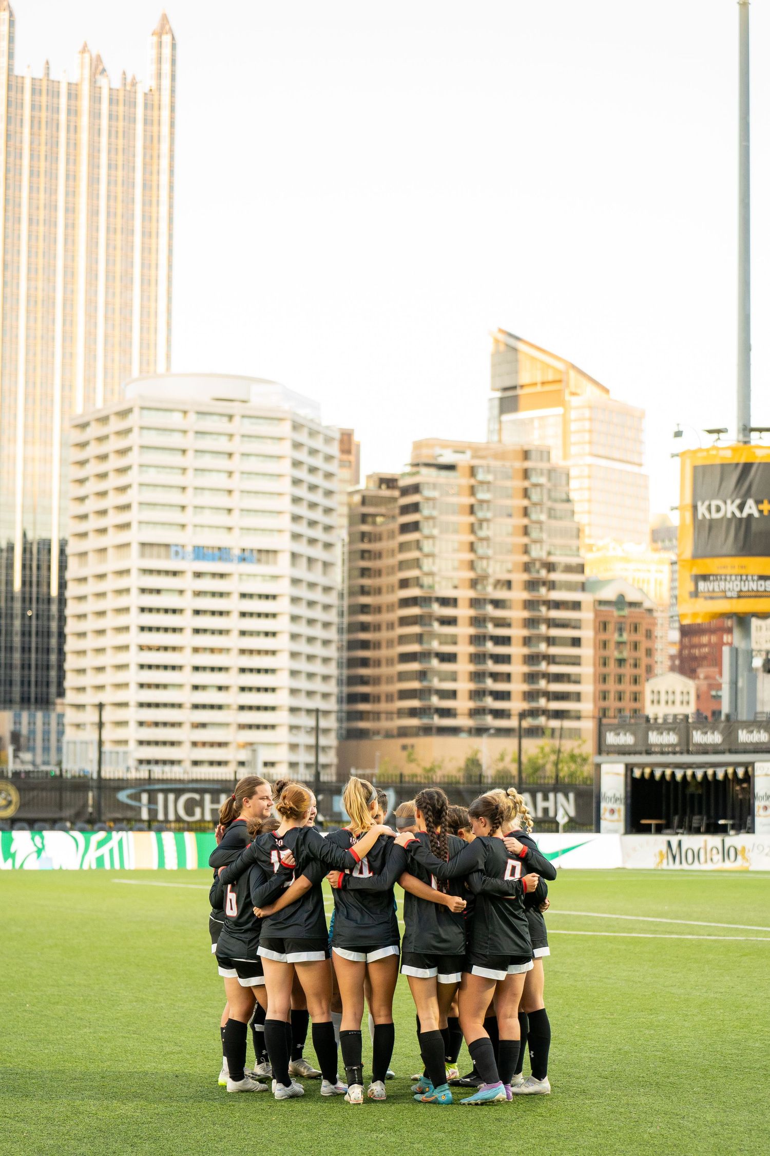 Grove City Women's Soccer Players in a huddle at Highmark Stadium