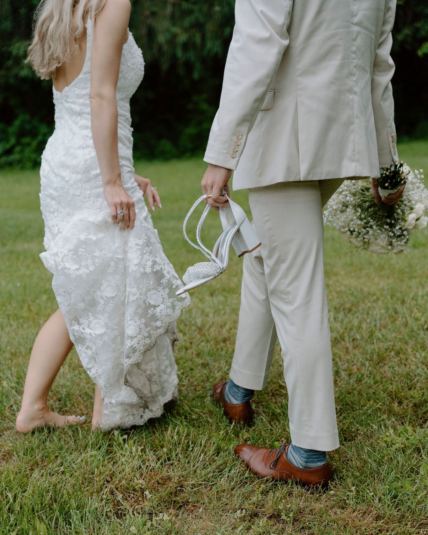 A series of wedding photos showing feet and legs of a couple on grass, with a white dress and tan suit visible.