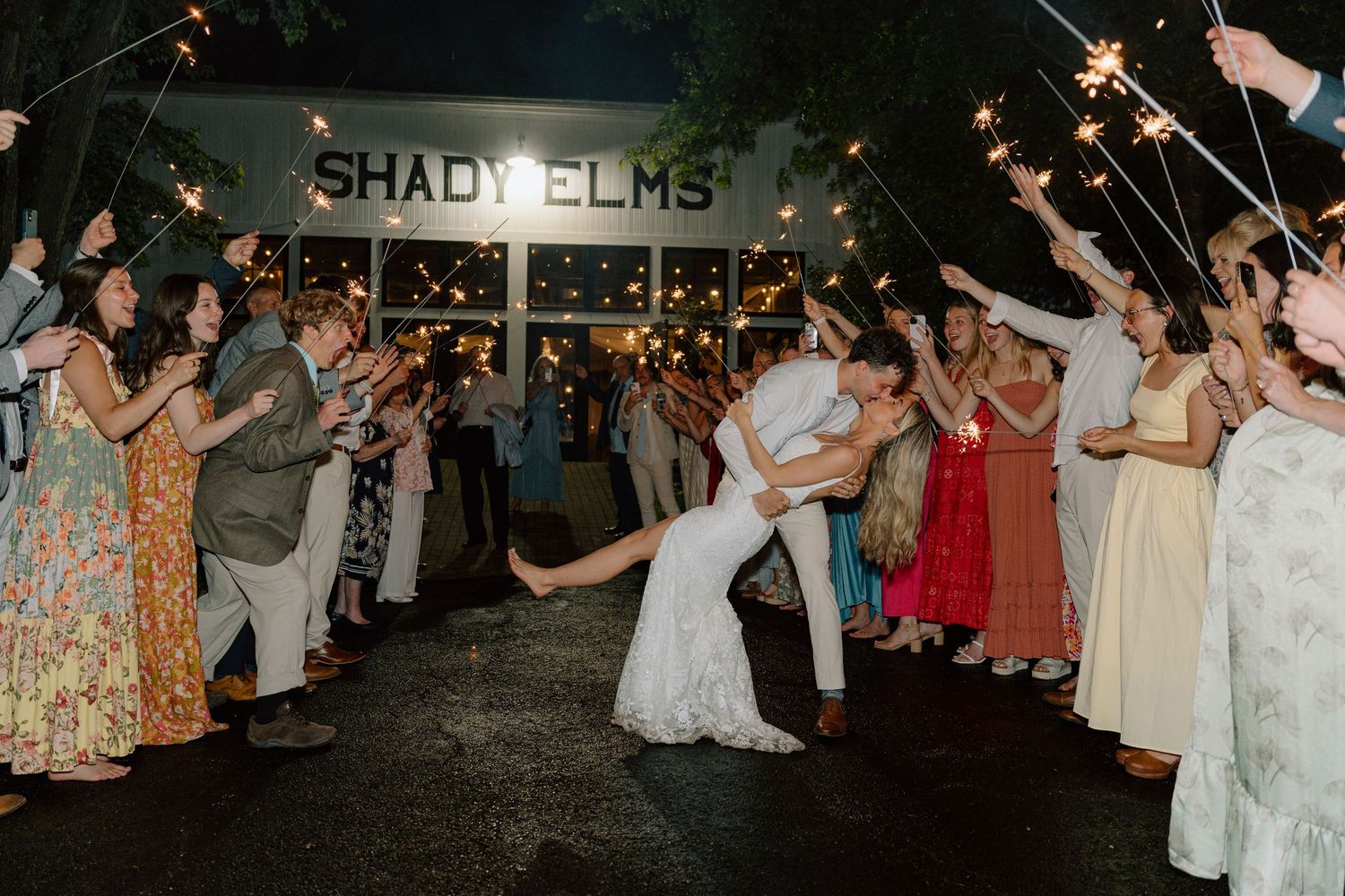 Wedding exit at Shady Elms venue with sparkler sendoff for newlyweds.