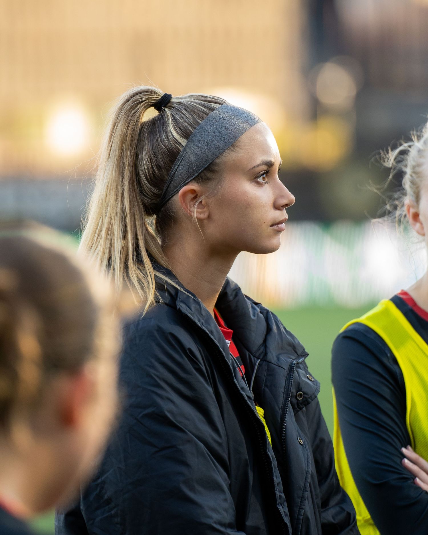 Grove City Women's Soccer Huddle with player looking at teammates